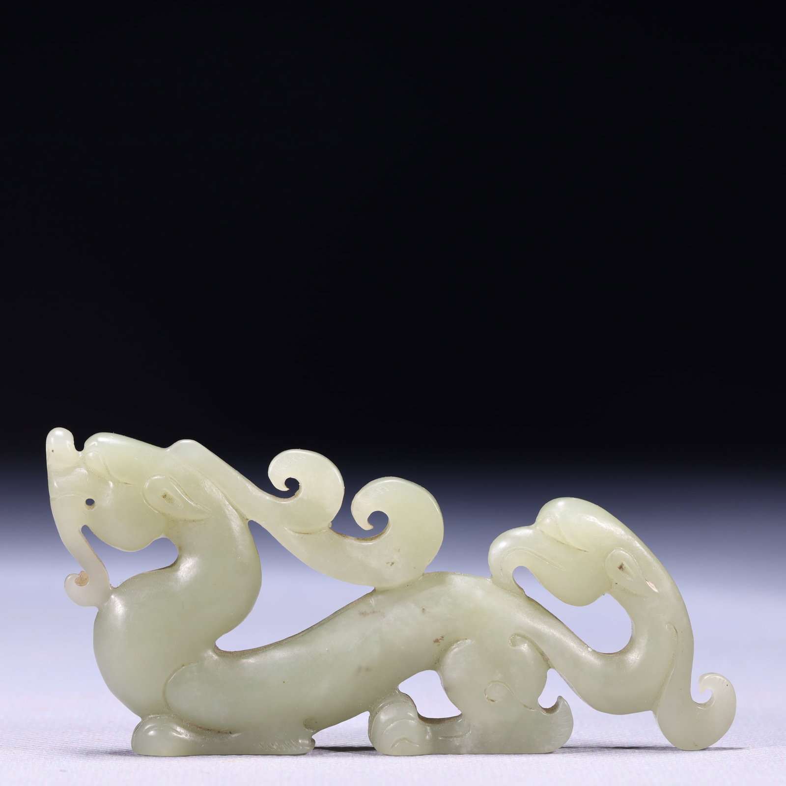 An Exquisite White Jade Dragon and Phoenix Ornament: An Exquisite White Jade Dragon and Phoenix Ornament,Qing Dynasty,China,Size:3.7inx0.4inx1.8in,Weight:60g 白玉龙凤摆件,中国清代
