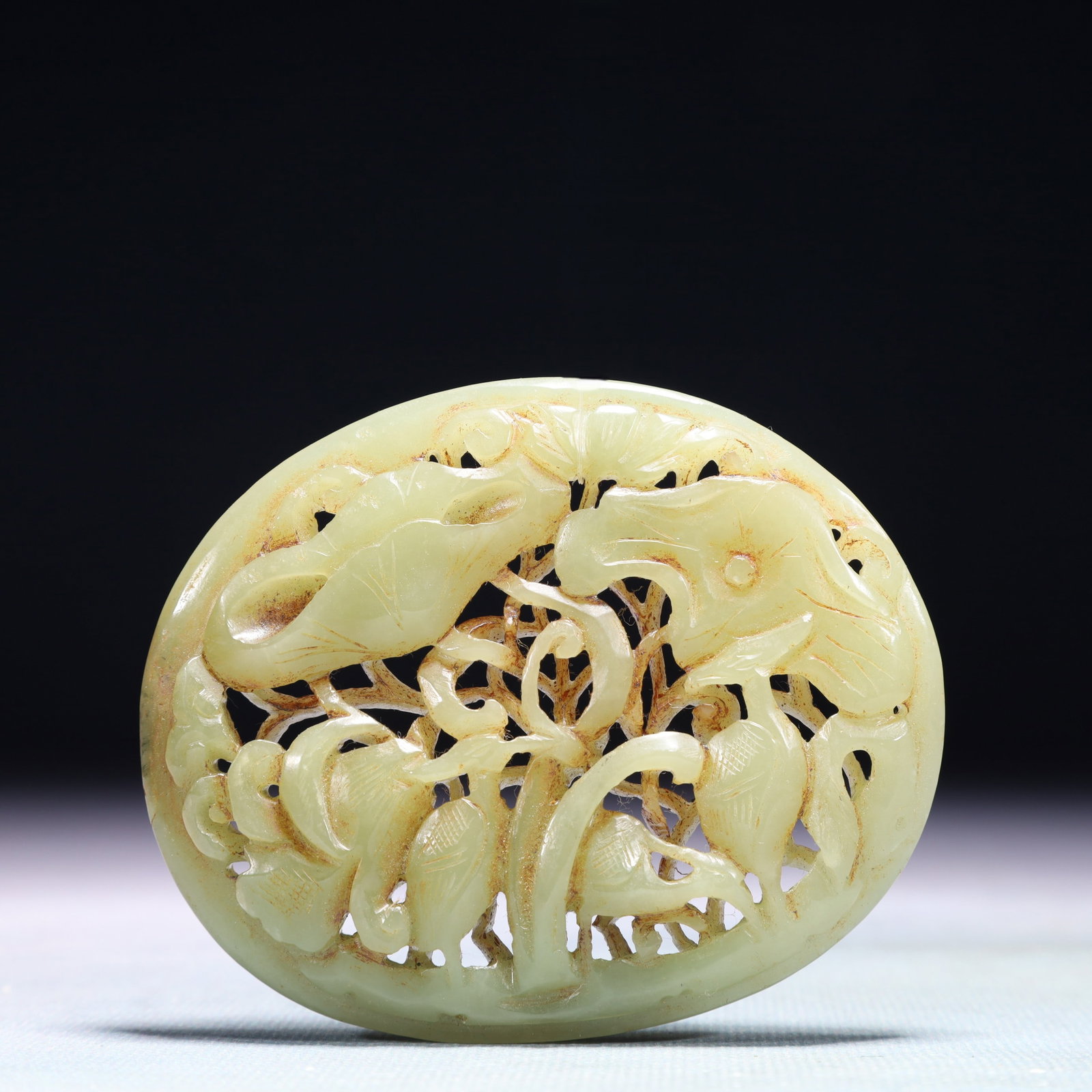 An Exquisite White Jade Flower Pattern Pendant: An Exquisite White Jade Flower Pattern Pendant,Qing Dynasty,China,Size:3.3inx2.8in,Weight:79.9g 白玉花卉纹佩,中国清代