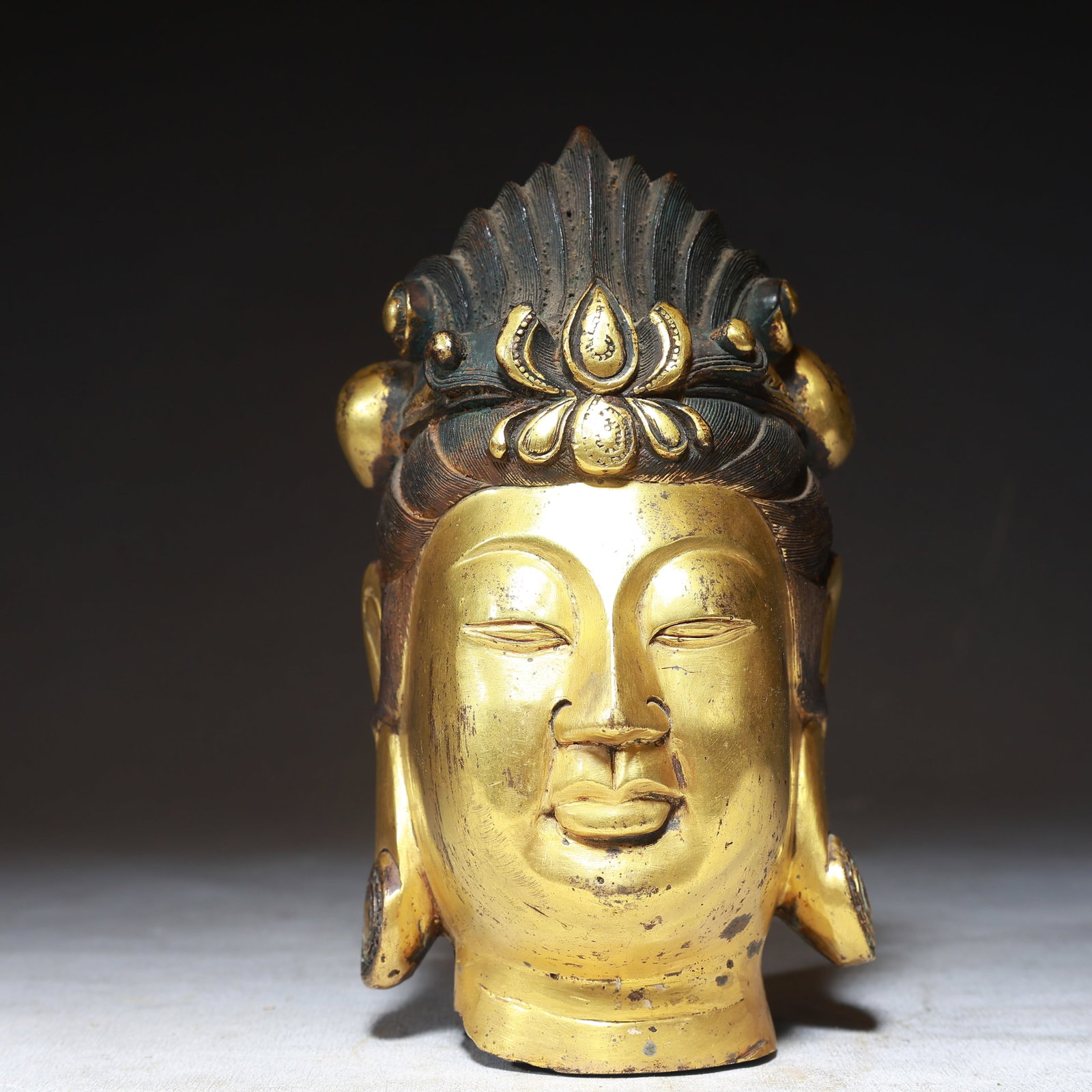 A Solemn Gilt Bronze Statue of Buddha Head: A Solemn Gilt Bronze Statue of Buddha Head,Qing Dynasty,China,Size:3.9inx3.9inx6.7in,Weight:1550g 铜鎏金佛头像,中国清代