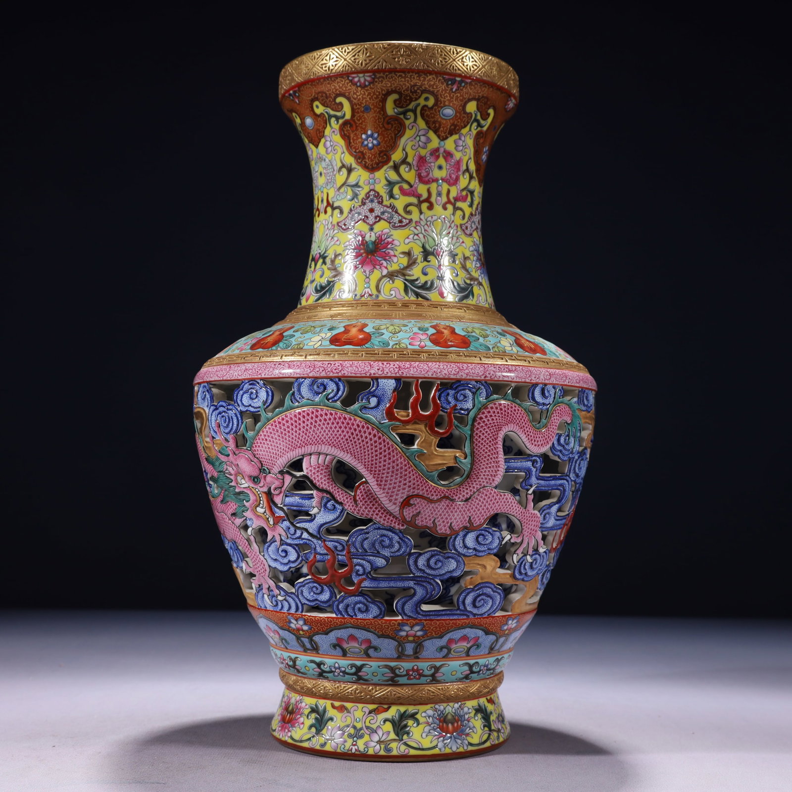 An Exquisite Famille-Rose Painted Gold Auspicious Cloud and Dragon Pattern Vase: An Exquisite Famille-Rose Painted Gold Auspicious Cloud and Dragon Pattern Vase,Qing Dynasty,China,Qianlong Four-character Mark,Size:7.5inx13in,Weight:3750g 粉彩描金祥