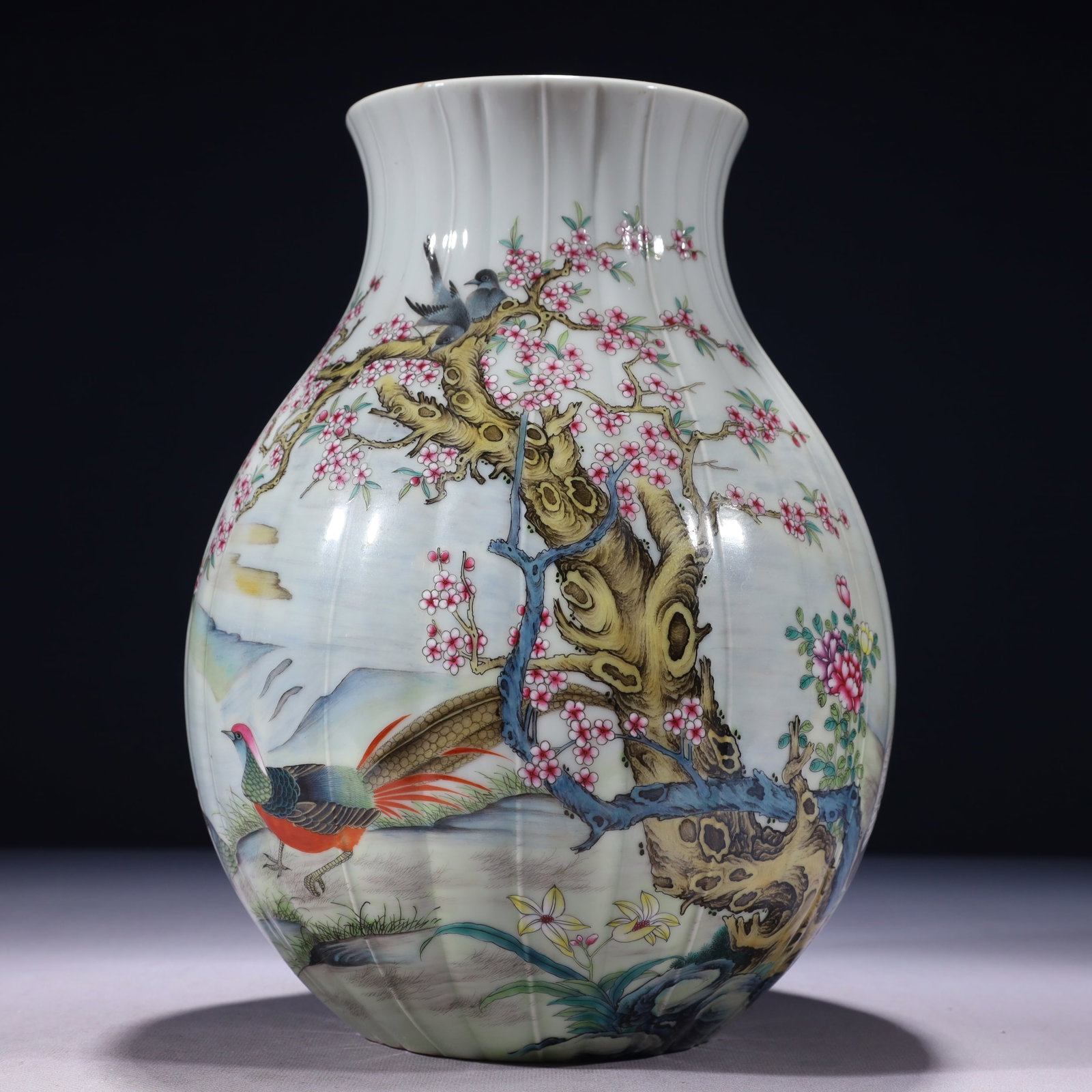 An Exquisite Famille-Rose Flower and Bird Pattern Vase,with poem: An Exquisite Famille-Rose Flower and Bird Pattern Vase,with poem,Qing Dynasty,China,Qianlong Six-character Mark,Size:7.9inx11.4in,Weight:2750g 粉彩花鸟纹瓶,带