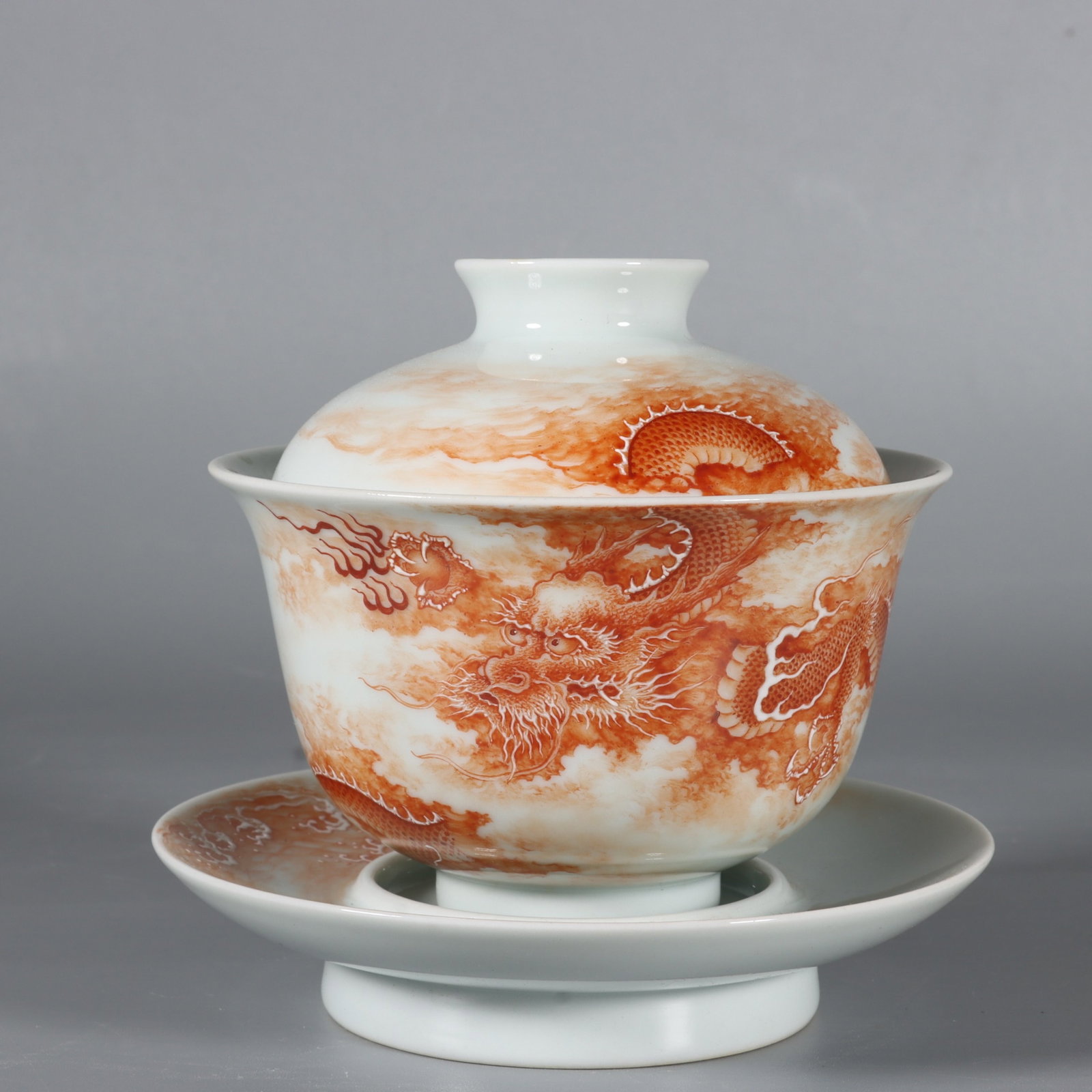 An Exquisite Iron-Red Auspicious Cloud and Dragon Pattern Bowl with Cover,with Plate: An Exquisite Iron-Red Auspicious Cloud and Dragon Pattern Bowl with Cover,with Plate,Qing Dynasty,China,Yongzheng Four-character Mark,Size:4.2inx3.9in 矾红祥云龙纹&