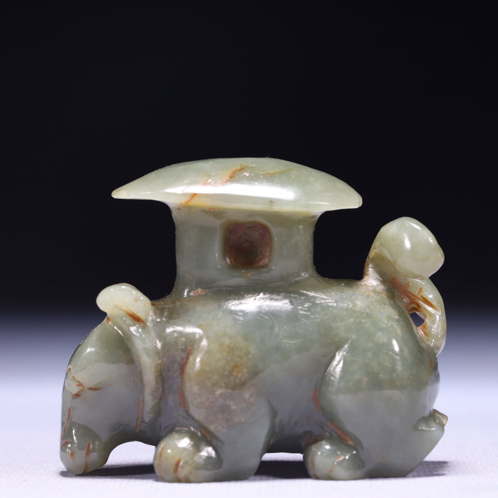 An Exquisite Green Jade Bear Ornament: An Exquisite Green Jade Bear Ornament,Qing Dynasty,China,Size:2.8inx1.2inx2.2in,Weight:178g 青玉熊摆件,中国清代