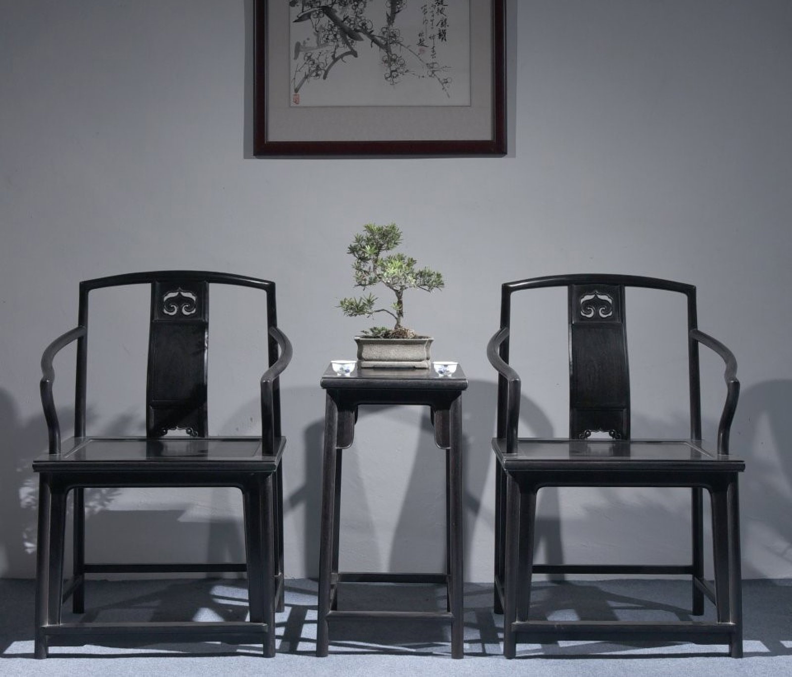 A Set of Zitanwood Ruyi Pattern Table and Armchair (1 of 9)