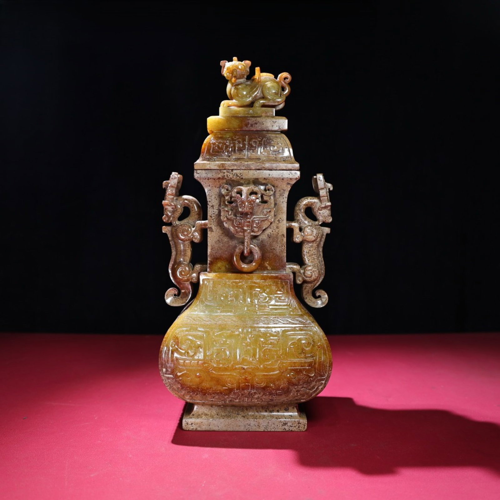 An Exquisite White Jade Beast-Face Pattern Double-Ears Bottle: An Exquisite White Jade Beast-Face Pattern Double-Ears Bottle,Qing Dynasty,China,Size:14.7inx6.4inx5in,Weight:3923g 白玉兽面纹双耳盖瓶,中