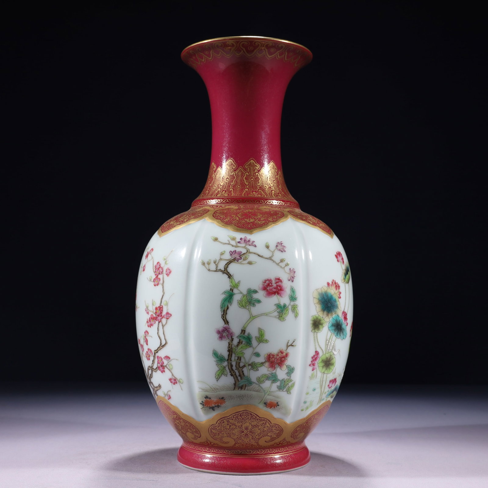 An Exquisite Famille-Rose Painted Gold Flower Pattern Vase: An Exquisite Famille-Rose Painted Gold Flower Pattern Vase,Qing Dynasty,China,Qianlong Six-character Mark,Size:6.3inx14.2in,Weight:2200g 粉彩描金花卉纹瓶