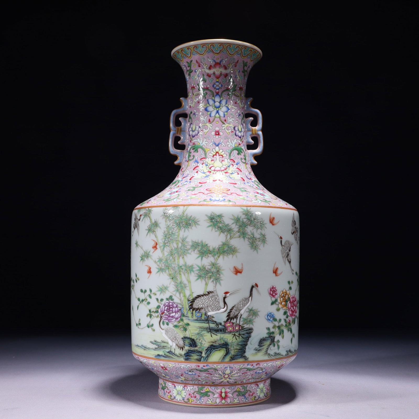 An Exquisite Pink Ground Famille-Rose Painted Gold Flower and Crane Pattern Double-Ears Vase,with: An Exquisite Pink Ground Famille-Rose Painted Gold Flower and Crane Pattern Double-Ears Vase,with poem,Qing Dynasty,China,Qianlong Six-character Mark,Size:6.3inx9.4in,Weight:2150g 粉地