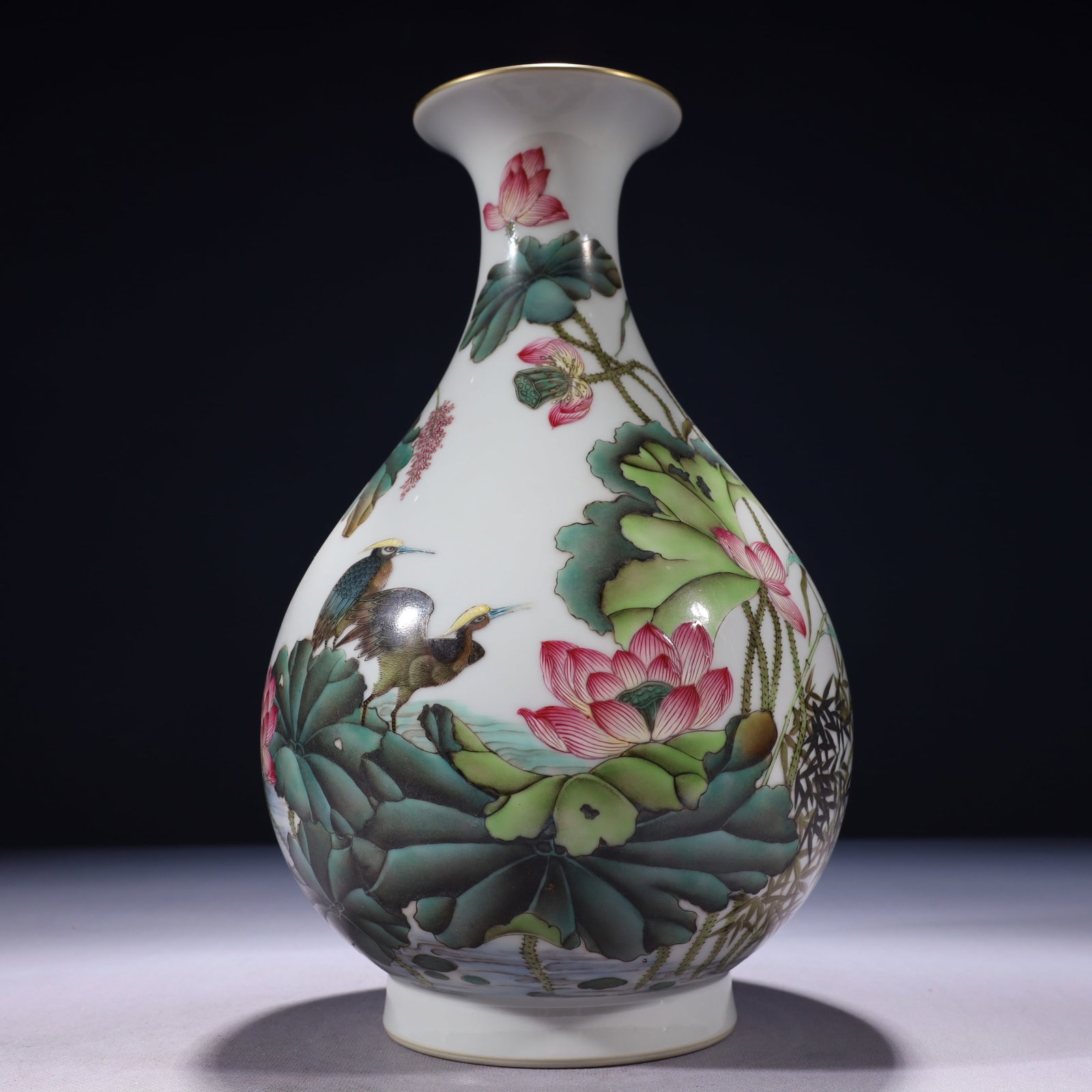 An Exquisite Famille-Rose Painted Gold Flower and Bird Pattern Vase: An Exquisite Famille-Rose Painted Gold Flower and Bird Pattern Vase,Qing Dynasty,China,Qianlong Six-character Mark,Size:7.1inx12.2in,Weight:1950g