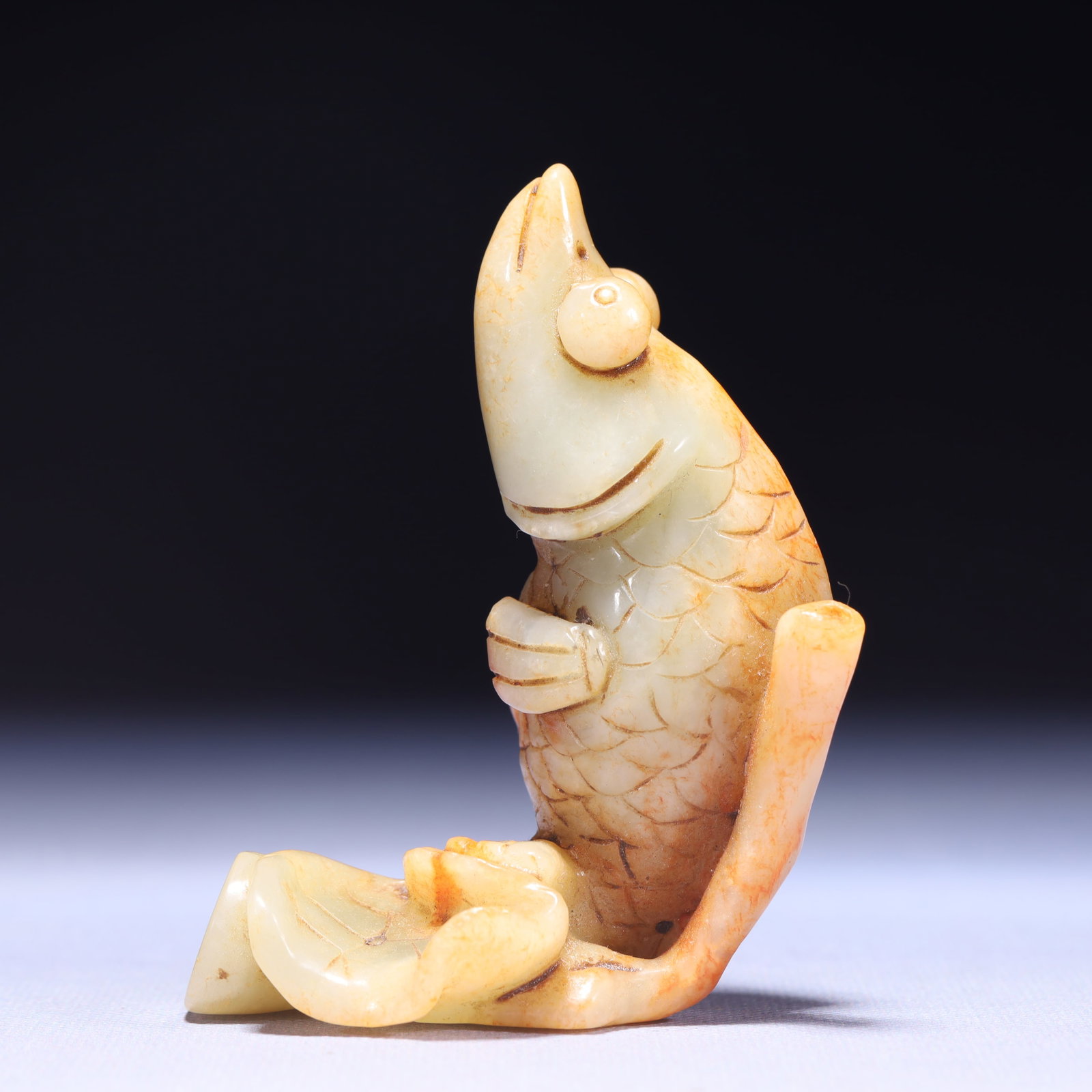 An Exquisite White Jade Fish Ornament: An Exquisite White Jade Fish Ornament,Qing Dynasty,China,Size:3.1inx1.6inx3.9in,Weight:197g 白玉鱼摆件,中国清代
