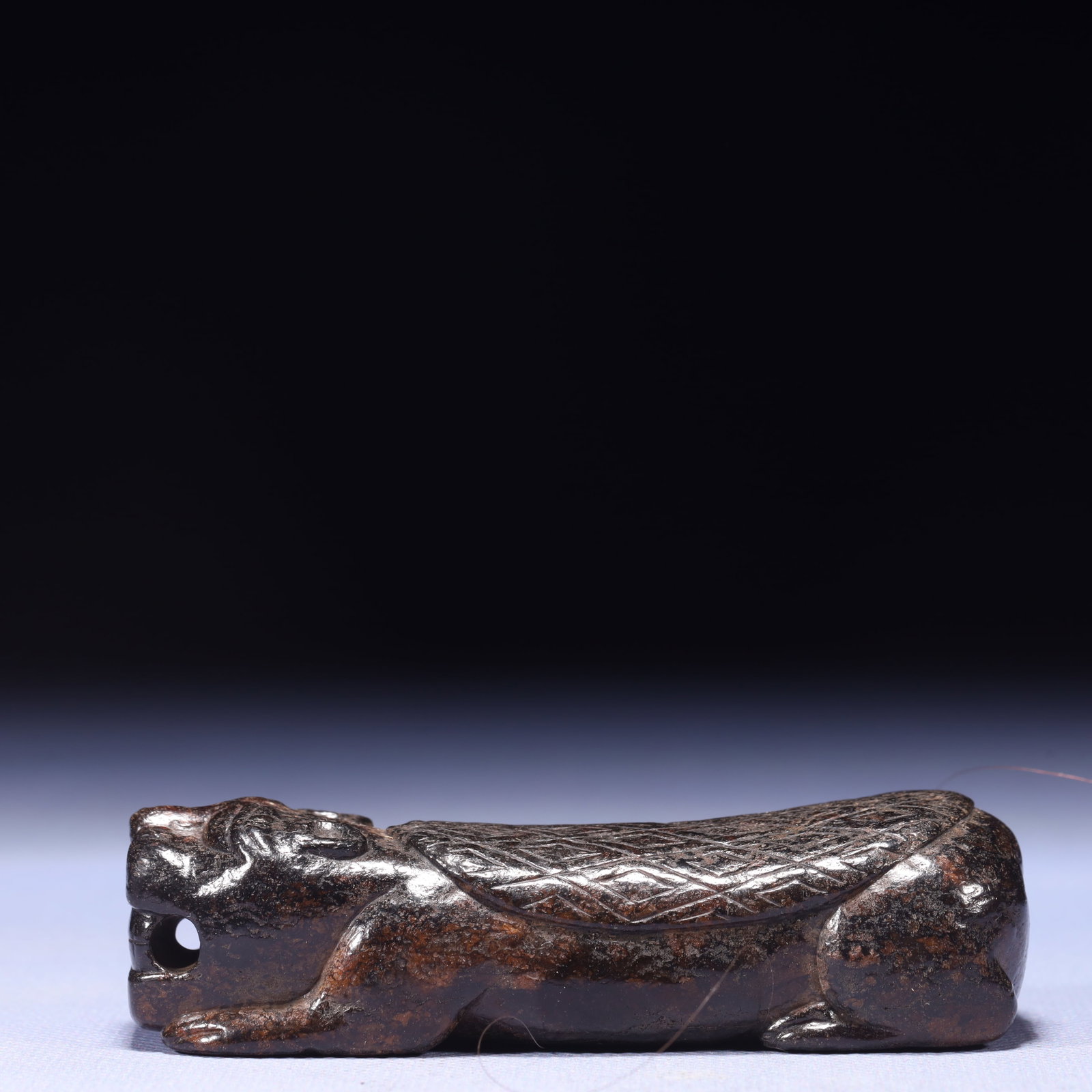 An Exquisite Archaic Jade Beast Ornament: An Exquisite Archaic Jade Beast Ornament,Ancient Time,China,Size:3.9inx1.4inx1in,Weight:223g 高古玉兽摆件,中国远古时期