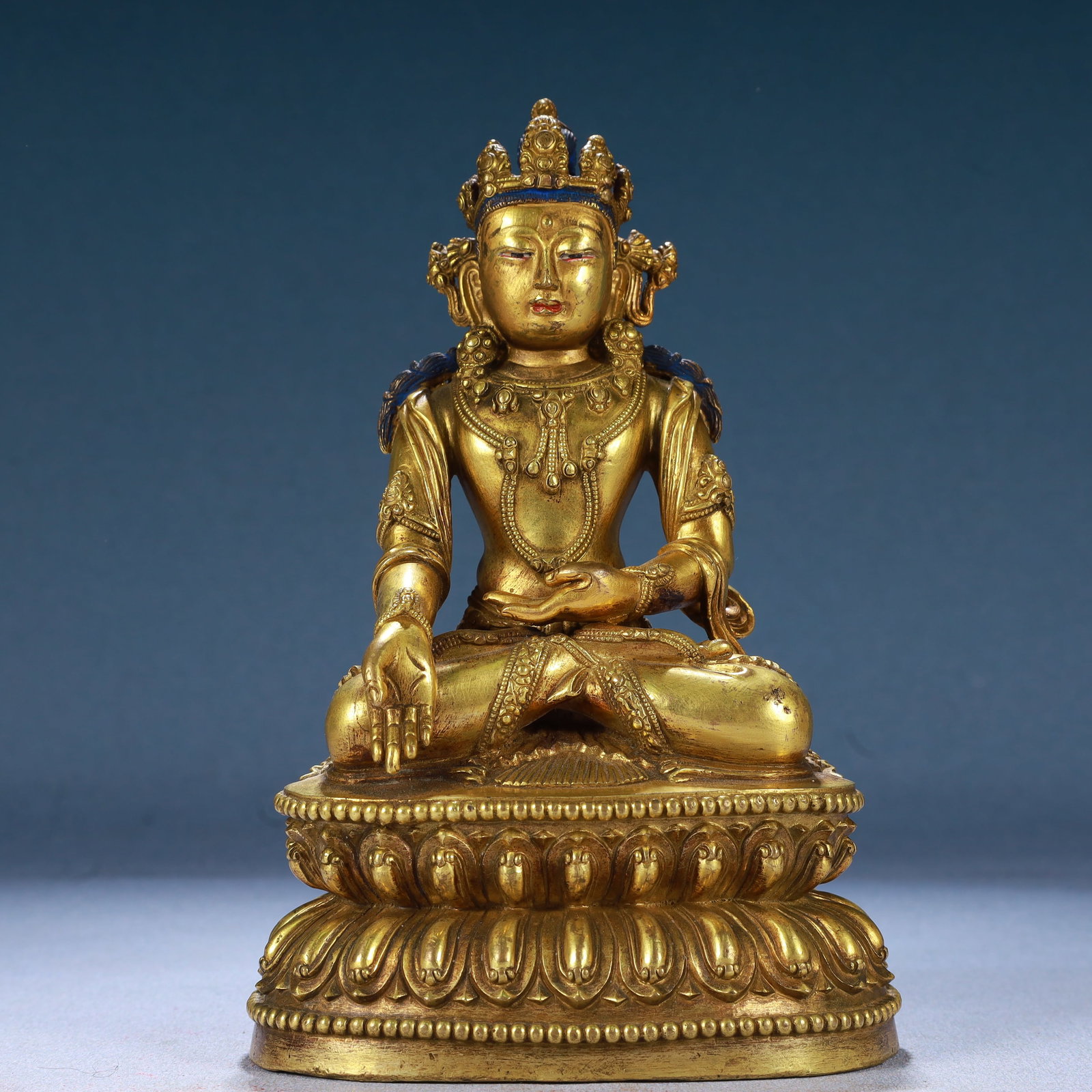 A Solemn Gilt Bronze Statue of Amitayus: A Solemn Gilt Bronze Statue of Amitayus,Qing Dynasty, China,Size:4.3inx3.5inx7.1in,Weight:1550g 铜鎏金无量寿佛像,中国清代
