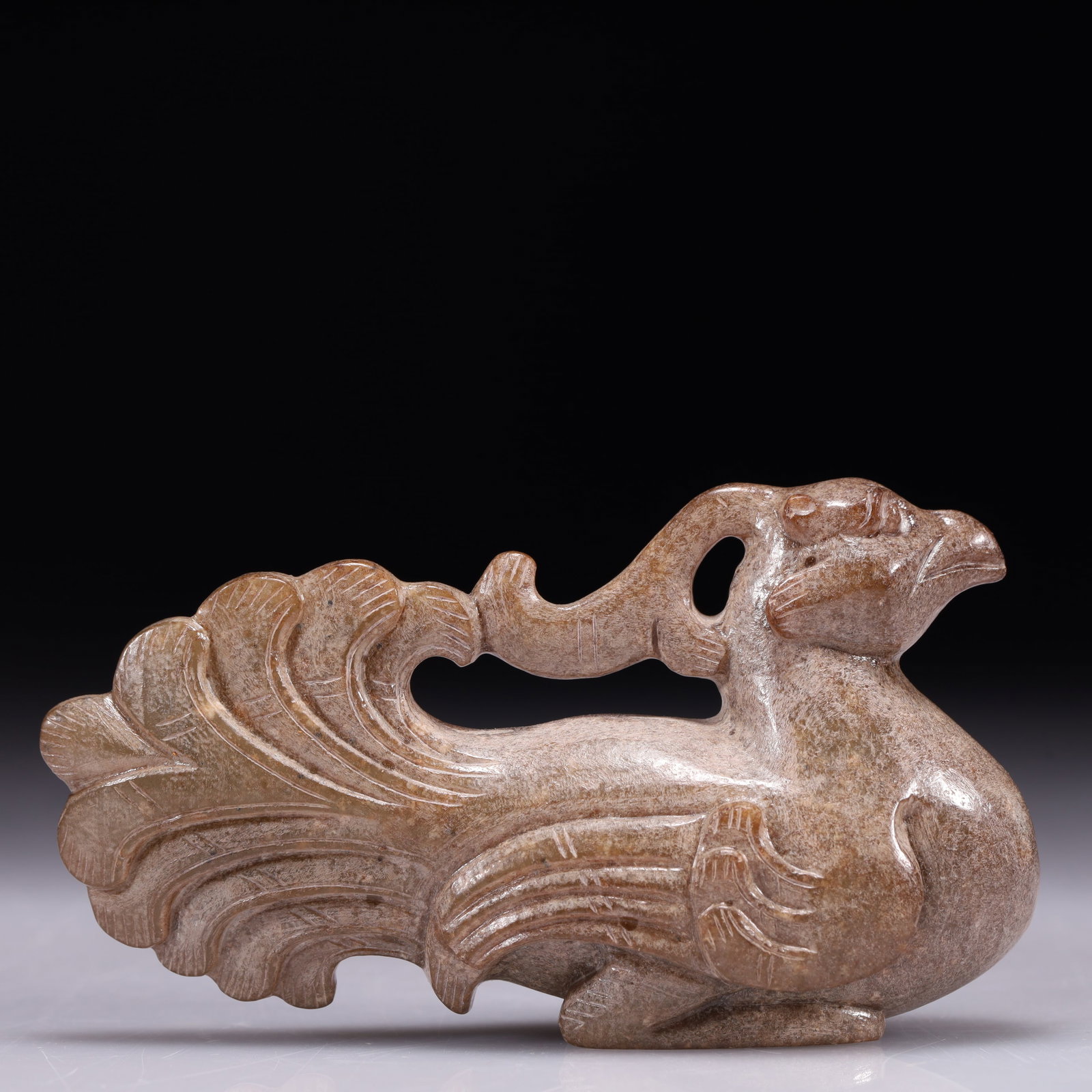 An Exquisite Archaic Jade Phoenix Ornament (1 of 8)