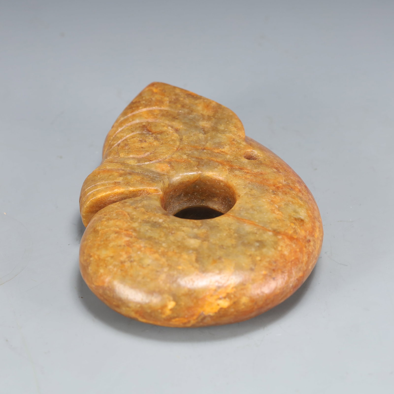 An Archaic Hongshan Culture Yellow Jade Pig and Dragon Ornament: An Archaic Hongshan Culture Yellow Jade Pig and Dragon Ornament,Ancient Time, China,Size:4.1inx9.8in Weight:850g 红山文化黄玉猪龙摆件,ߑ