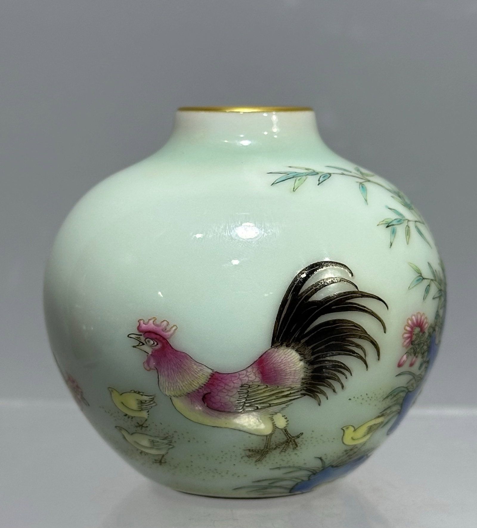 An Exquisite Celadon Glazed Famille-Rose Painted Gold Flower and Rooster Pattern Vase: An Exquisite Celadon Glazed Famille-Rose Painted Gold Flower and Rooster Pattern Vase,Qing Dynasty,China,Qianlong Four-character Mark,Size:2.5inx2.8in 青釉粉彩描金&