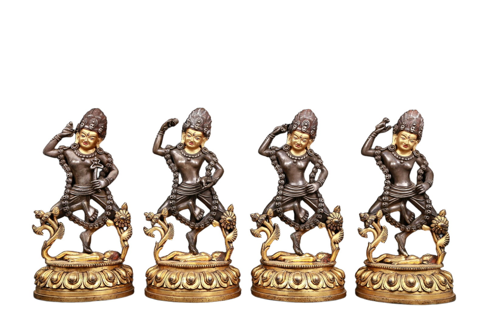 A set of exquisite gilt bronze and silver Vajra statues: set of exquisite gilt-bronze and silver Vajra statues , Qing Dynasty, China. The Vajra's figure is solemn and majestic, symbolizing strong will and invincible power. At the same time, his face is sole