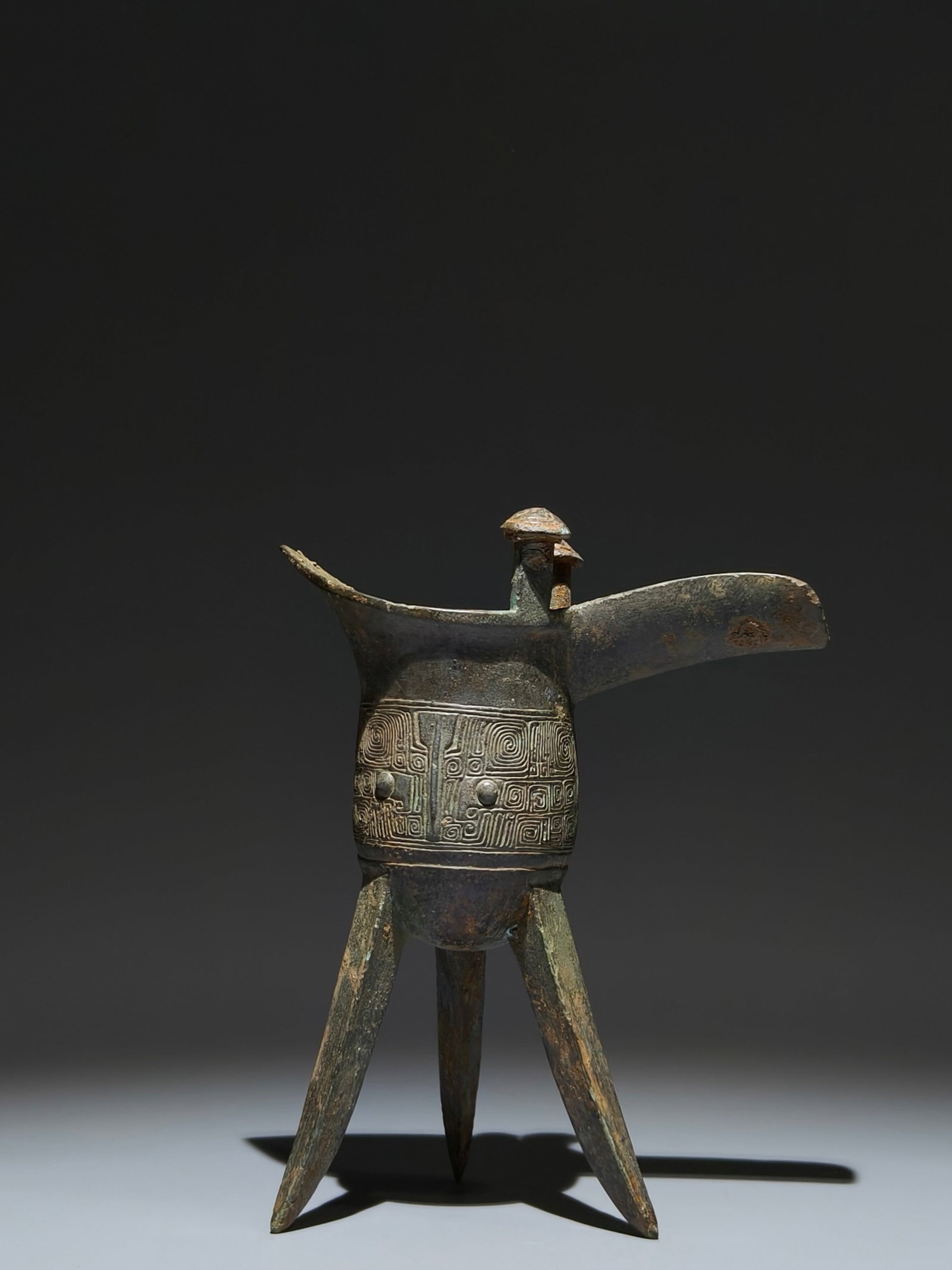 An Archaic Bronze Auspicious Cloud Pattern Tripod Cup - 5