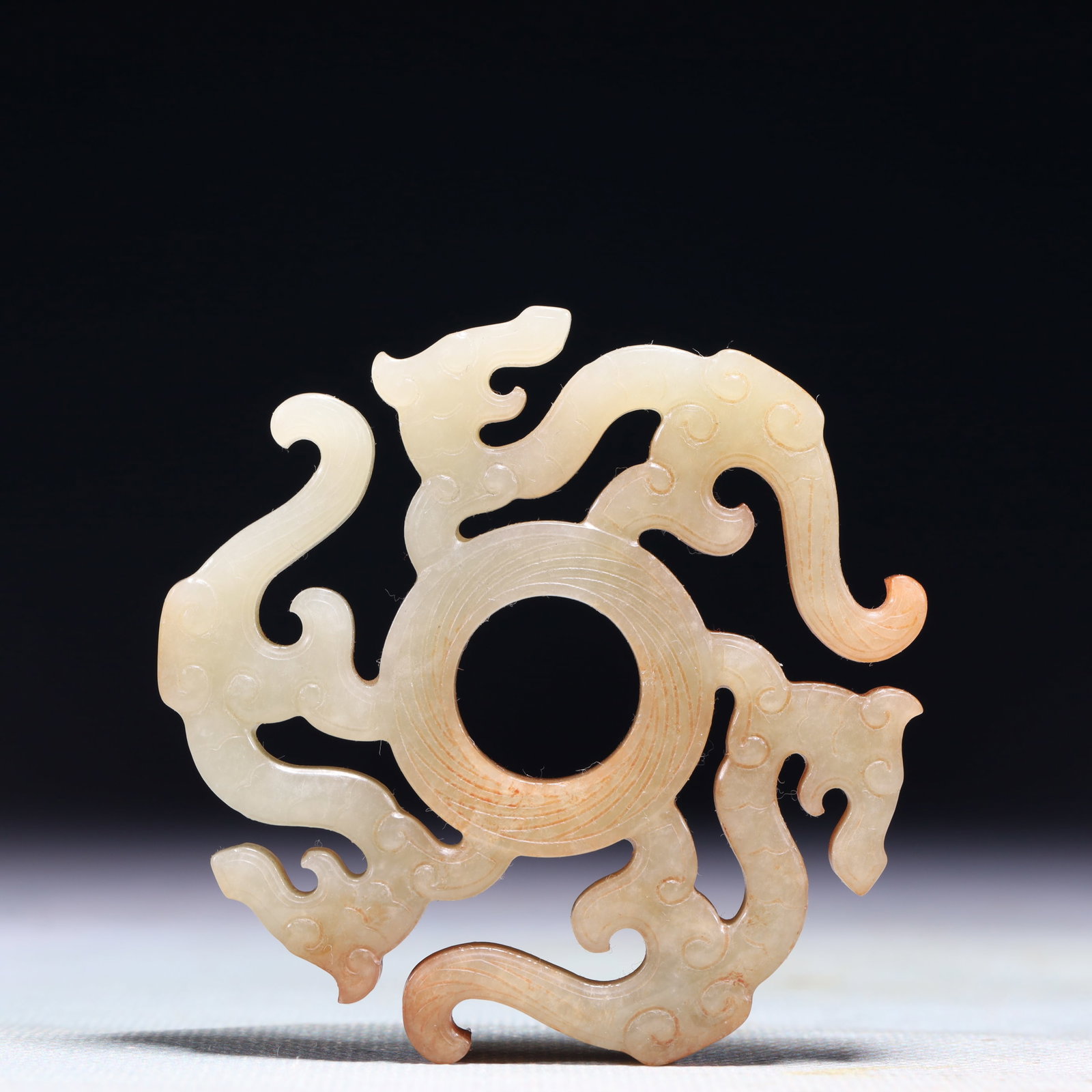 An Exquisite White Jade Dragon Pattern Pendant: An Exquisite White Jade Dragon Pattern Pendant,Qing Dynasty,China,Size:2.6inx2.6in,Weight:53.8g 白玉龙纹佩,中国清代