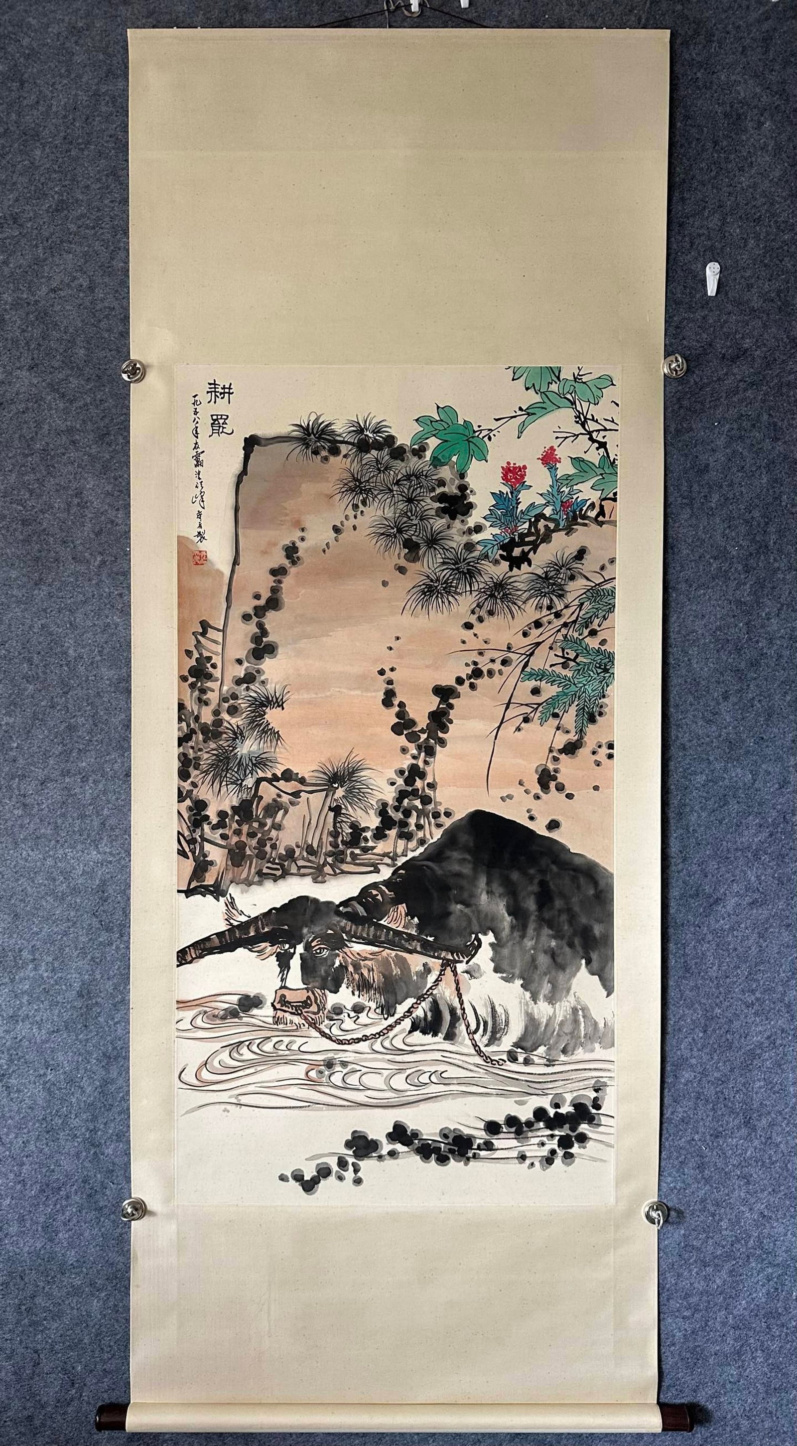 A Chinese Vertical Scroll Ink Painting of Buffalo on Paper: A Chinese Vertical Scroll Ink Painting of Buffalo on Paper,Pan Tianshou,Size:26.2inx49.8in 一幅中国水墨牛画立轴,潘天寿