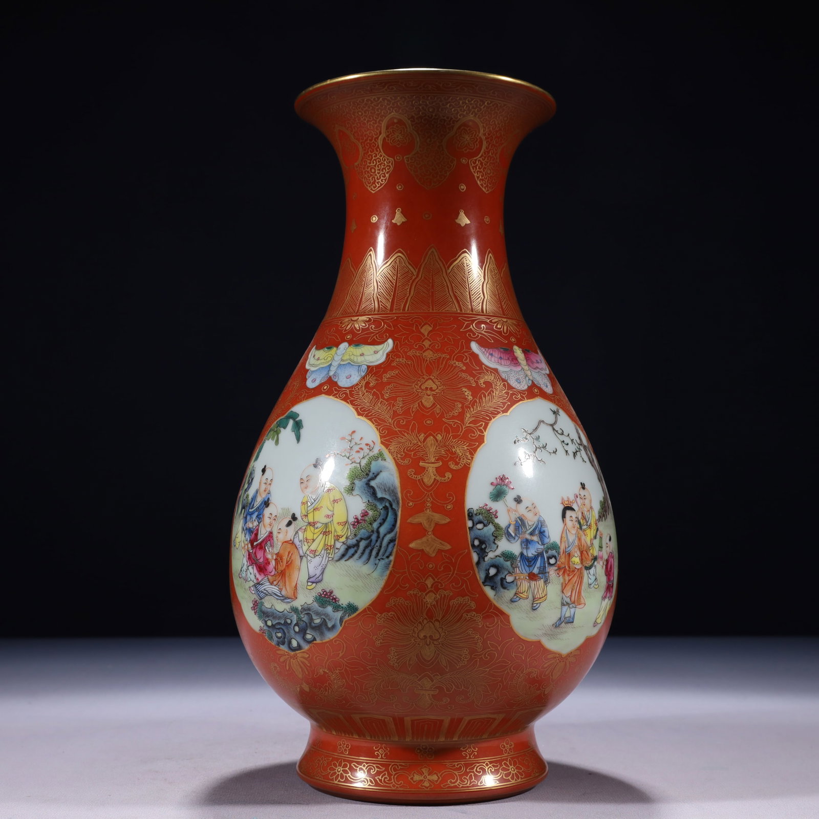 An Exquisite Red Ground Famille-Rose Painted Gold Character and Story Pattern Vase: An Exquisite Red Ground Famille-Rose Painted Gold Character and Story Pattern Vase
