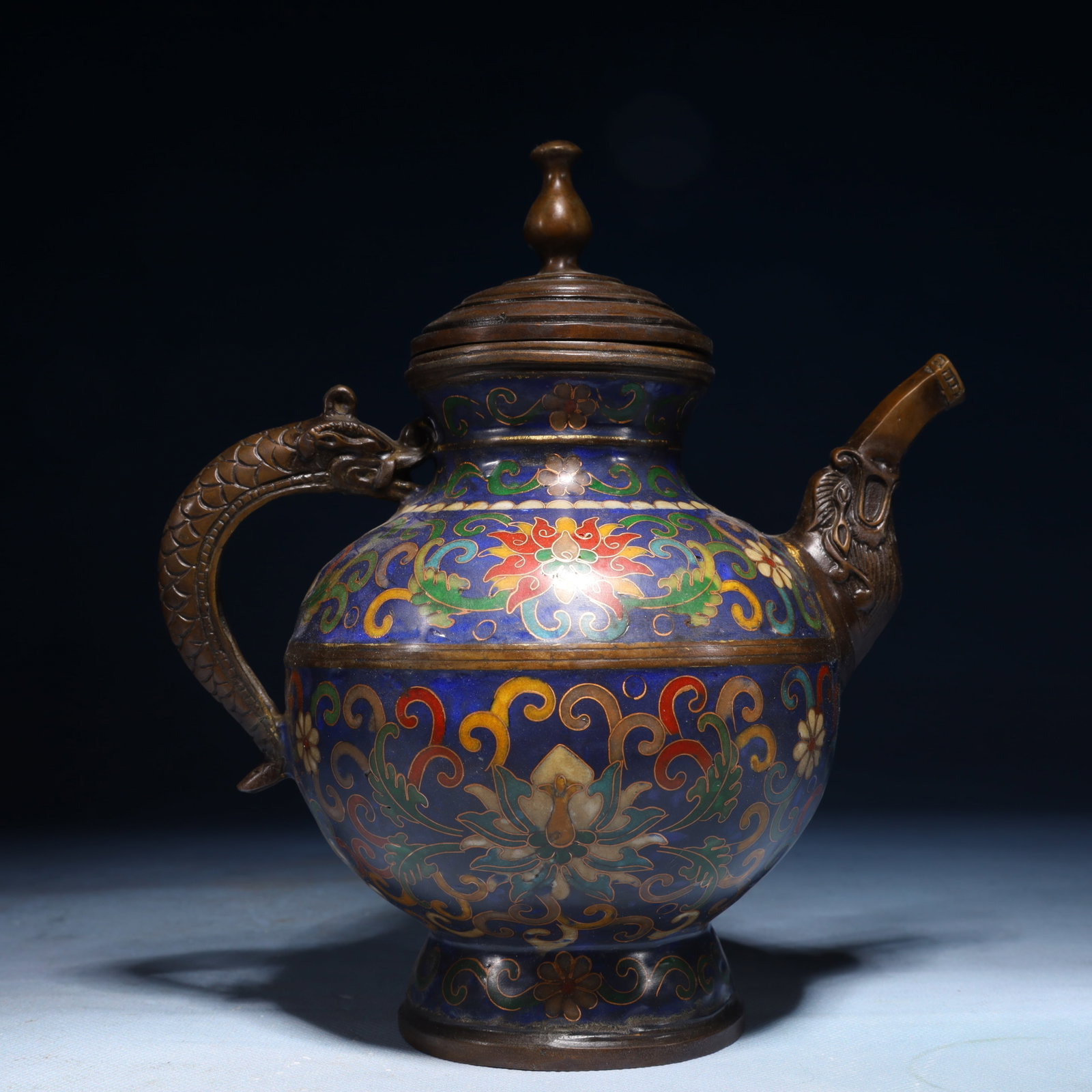 An Exquisite Cloisonne Flower and Dragon Pattern Ewer: An Exquisite Cloisonne Flower and Dragon Pattern Ewer,Qing Dynasty,China,Size:8.3inx7.5inx5.1in,Weight:1250g 景泰蓝花卉龙纹执壶,中国&#
