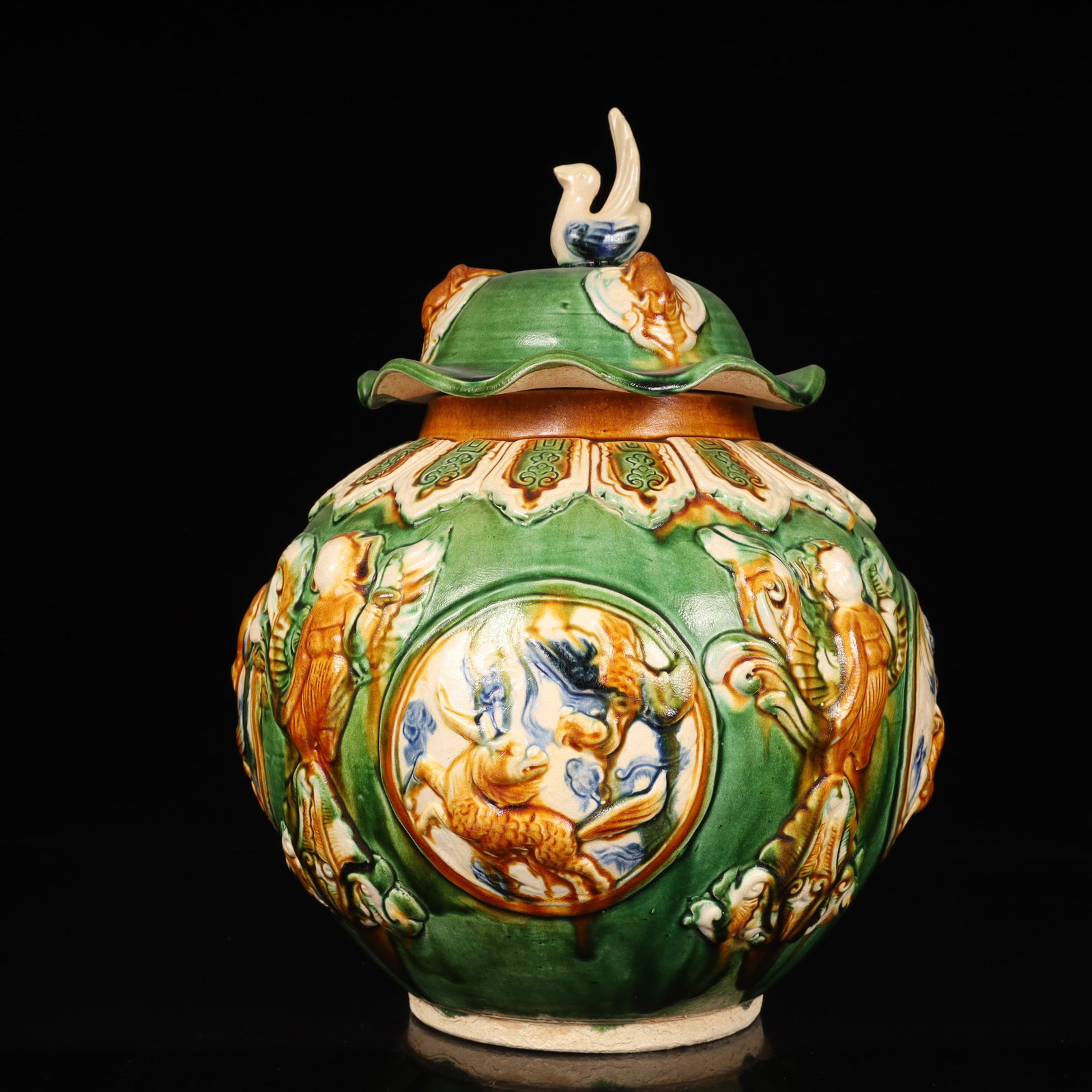 A Rare Tang Tri-Color Glazed Pottery Character and Story Pattern Cover Jar: A Rare Tang Tri-Color Glazed Pottery Character and Story Pattern Cover Jar,Tang Dynasty, China,Size:11inx11inx13.4in,Weight:3550g