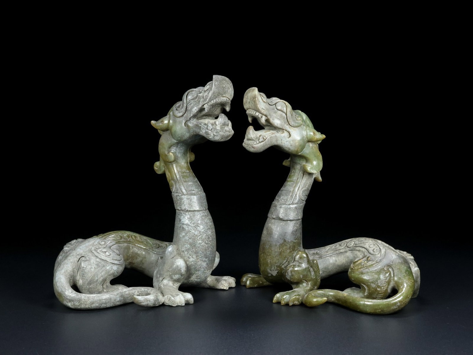 A Pair of Exquisite Yellow Jade Dragon Ornaments: A Pair of Exquisite Yellow Jade Dragon Ornaments,Qing Dynasty,China,Size:6.4inx5.7inx3.2in,Weight:1255g 一对黄玉龙摆件,中国清代