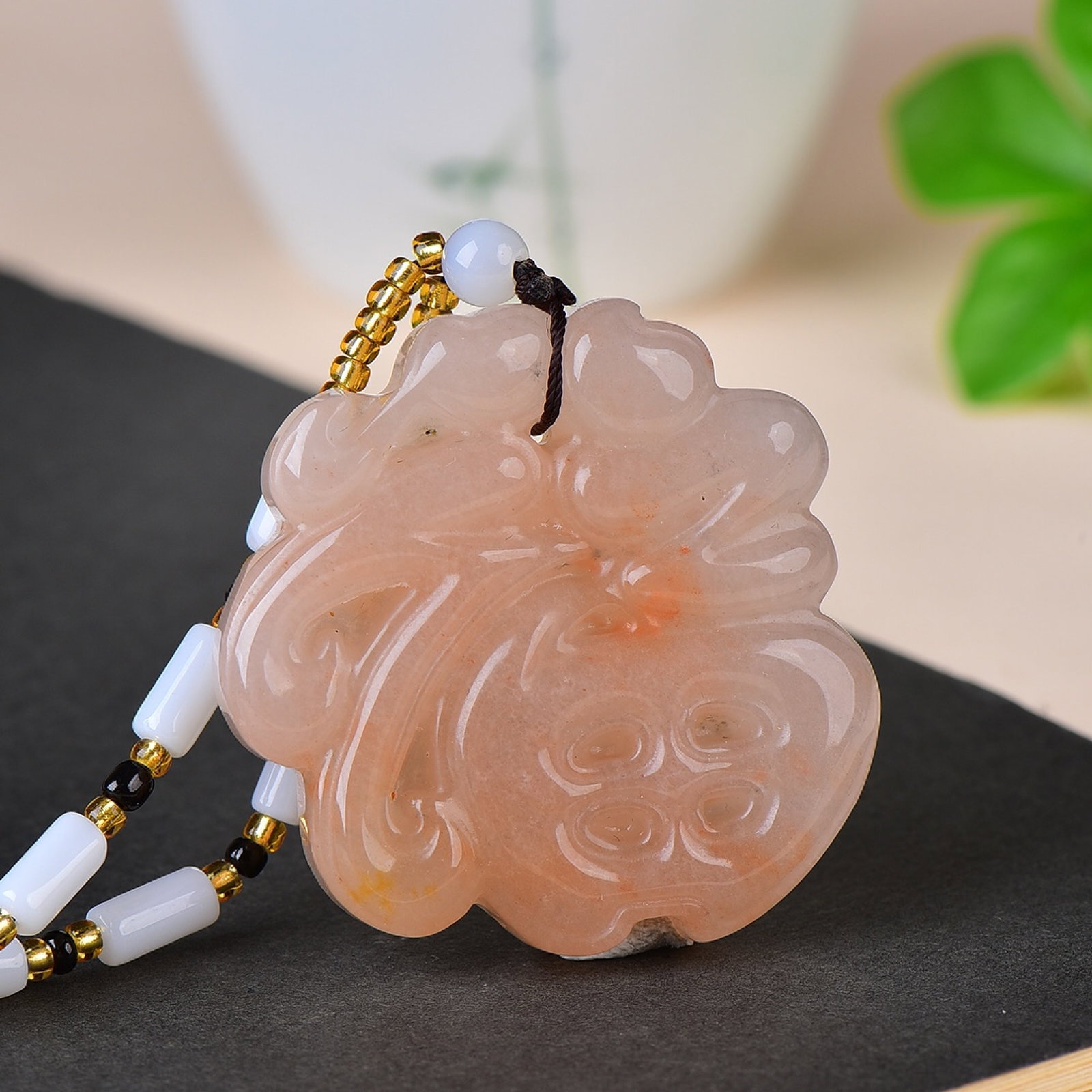 An Exquisite Red Jade Pendant