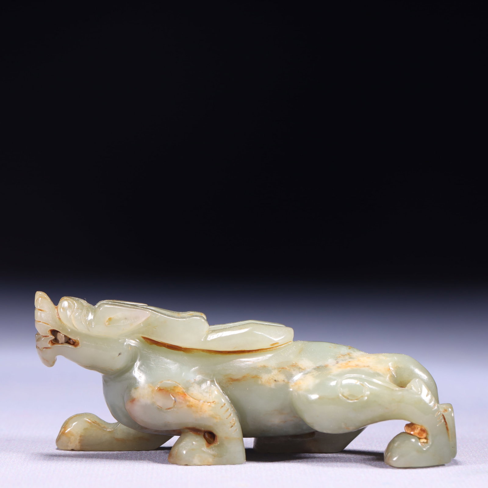 An Exquisite White Jade Beast Ornament: An Exquisite White Jade Beast Ornament,Qing Dynasty,China,Size:3.9inx1.2inx1.8in,Weight:118g 白玉兽摆件,中国清代