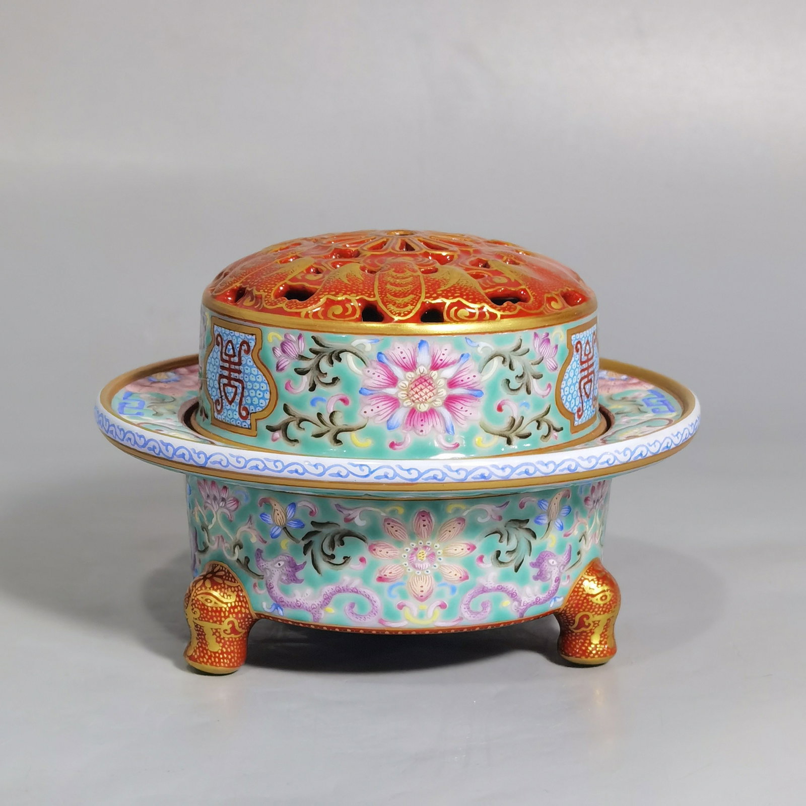 An Exquisite Turquoise Glazed Enamel Painted Gold Lotus Pattern Tripod Censer: An Exquisite Turquoise Glazed Enamel Painted Gold Lotus Pattern Tripod Censer,Qing Dynasty,China,Qianlong Four-character Mark,Size:2.7inx3.8in 松石绿釉珐琅彩&