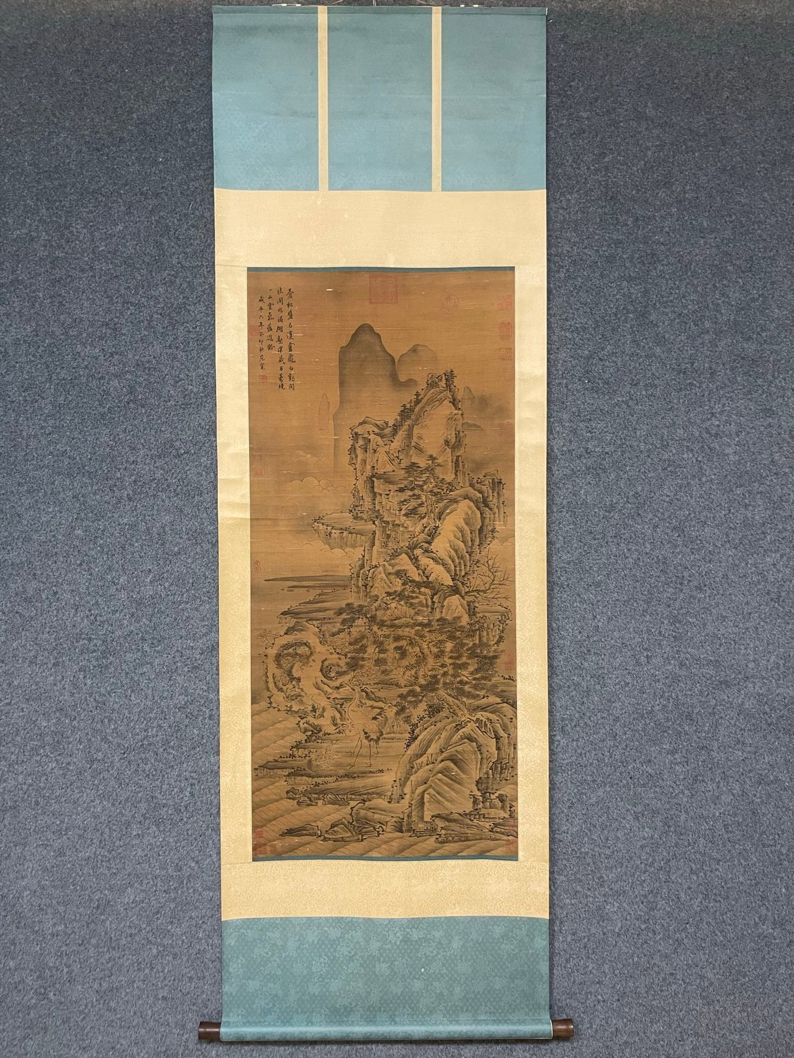 A Chinese Vertical Scroll Ink Painting of Landscape on Silk: A Chinese Vertical Scroll Ink Painting of Landscape on Silk,Fan Kuan,Size:23.2inx51.6in 一幅中国水墨绢本山水画立轴,范