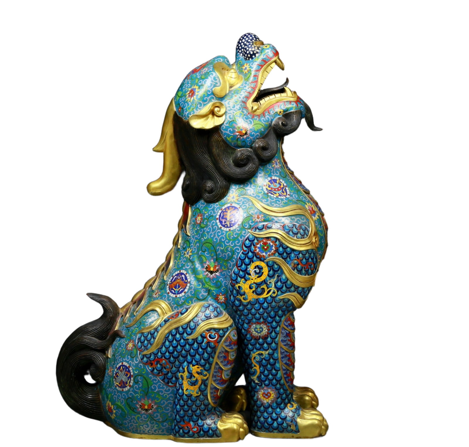 An exquisite cloisonn?? unicorn ornament: A cloisonné unicorn ornament Qing Dynasty, China. The unicorn is lifelike and graceful, seeming to convey a message of auspiciousness and protection. The cloisonné blue background is dotted 
