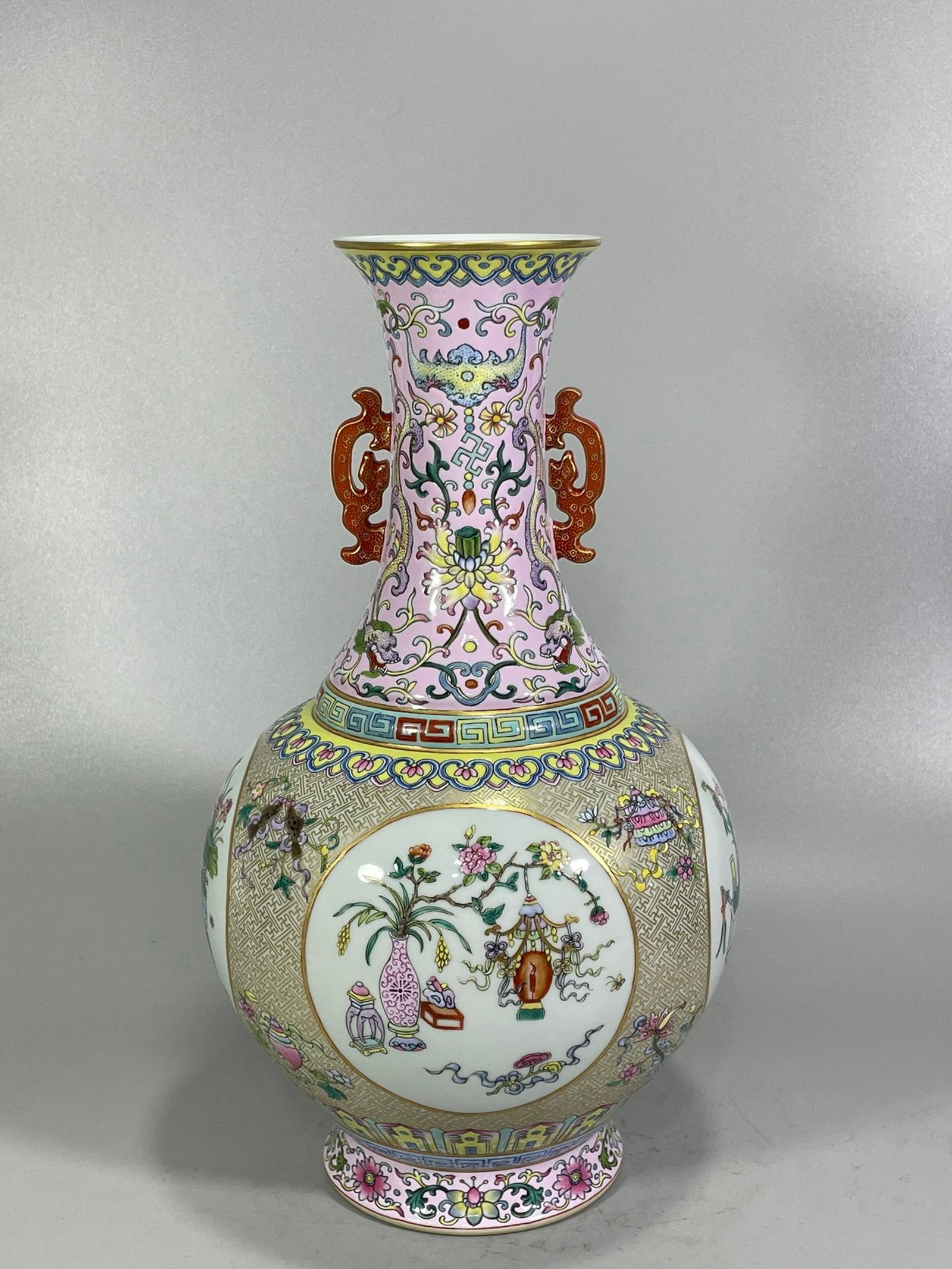 A Rare Famille-Rose Painted Gold Eight Treasures Pattern Double-Ears Vase: A Rare Famille-Rose Painted Gold Eight Treasures Pattern Double-Ears Vase,Qing Dynasty,China,Qianlong Six-character Mark,Size:13.2inx7.7in 粉彩描金八宝纹Ö