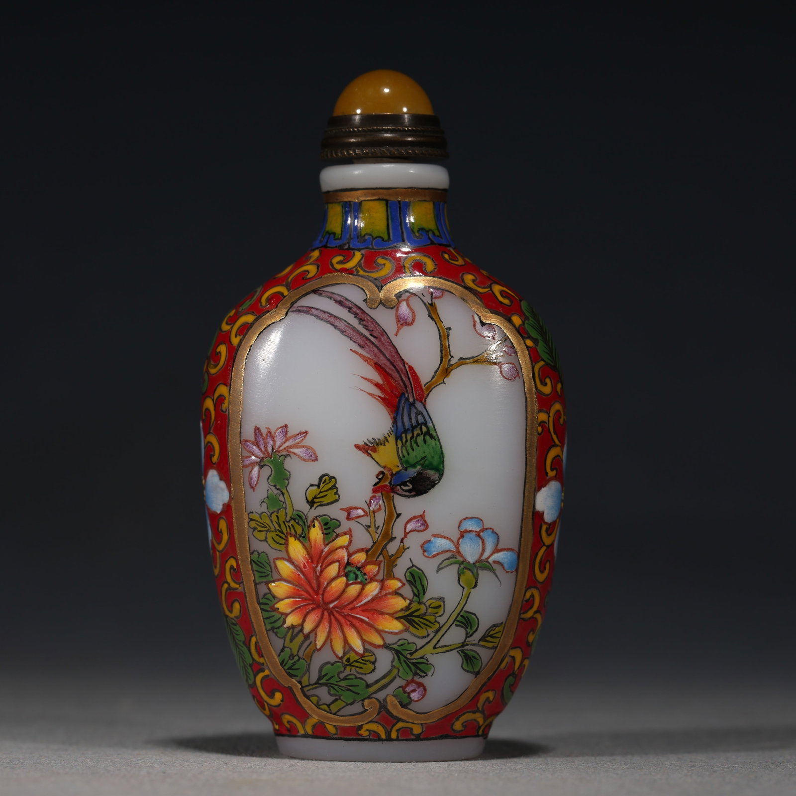 An Exquisite Glass Enamel Bird and Flower Pattern Snuff Bottle: An Exquisite Glass Enamel Bird and Flower Pattern Snuff Bottle,Qing Dynasty, China,Qianlong Four-character Mark,Size:1.6in×0.8in×3in 琉璃珐琅彩花鸟&