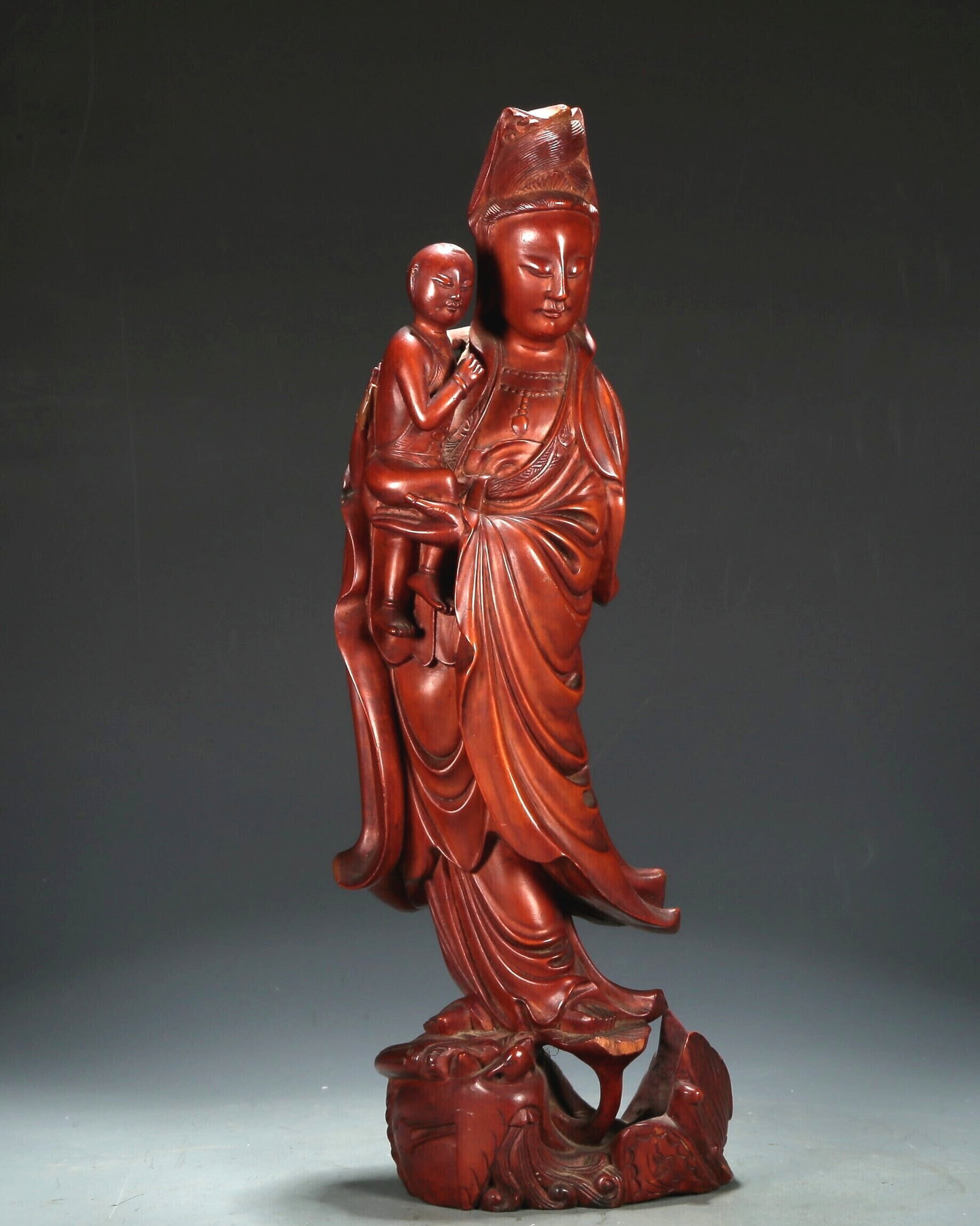 A Marvelous Boxwood 'Guanyin And Boy' Decoration: A Marvelous Boxwood 'Guanyin And Boy' Decoration. Stood on a base, body rendered clad in long, flowing robes, the voluminous drapery elegantly cascading in folds. Chinese Qing Dynasty. Size:3.9inx2.8i