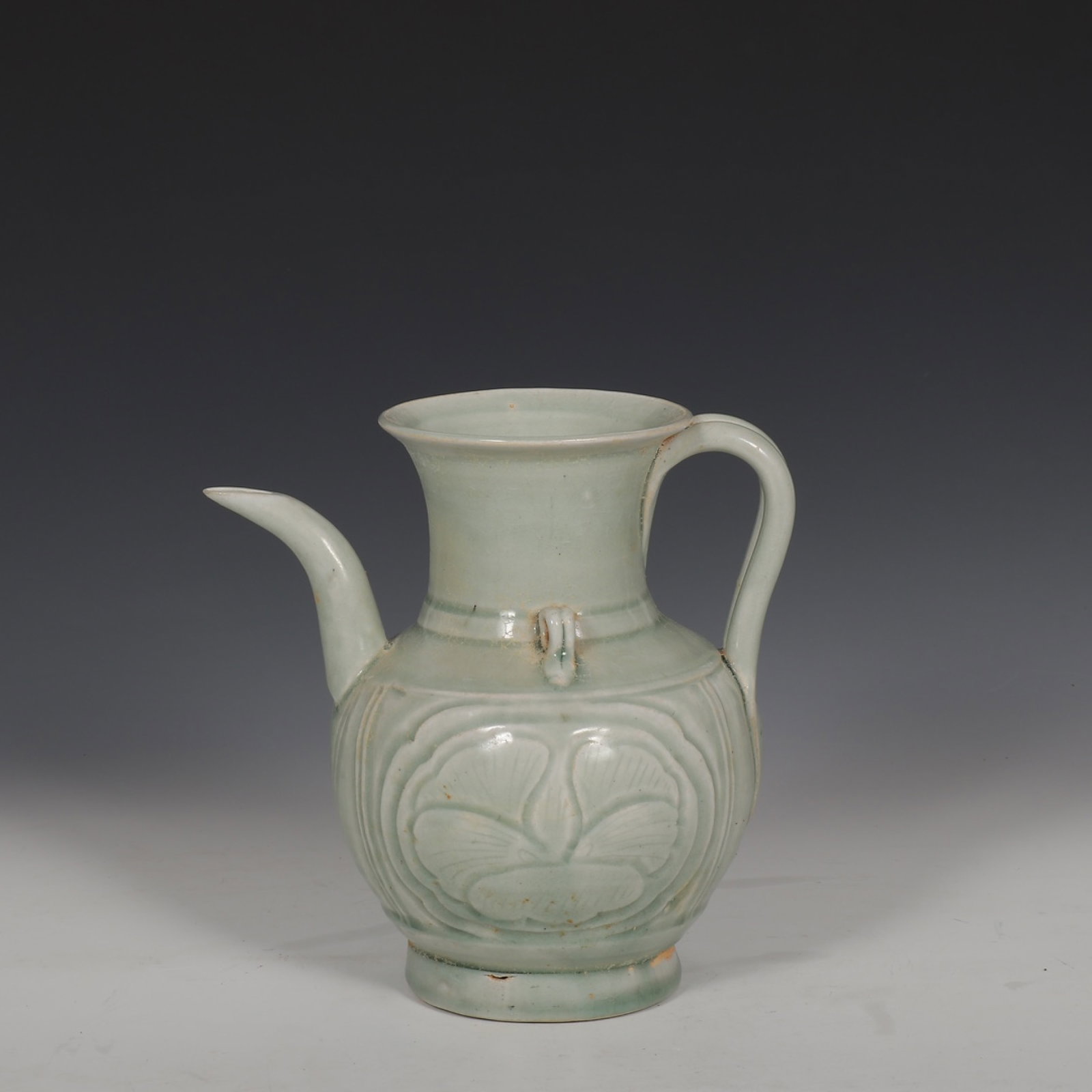 An Exquisite Yue yao Celadon Flower Pattern Ewer: An Exquisite Yue yao Celadon Flower Pattern Ewer,The Five Dynasties of China,Size:7.7inx5.9in 越窑青瓷花卉纹执壶,中国五代&