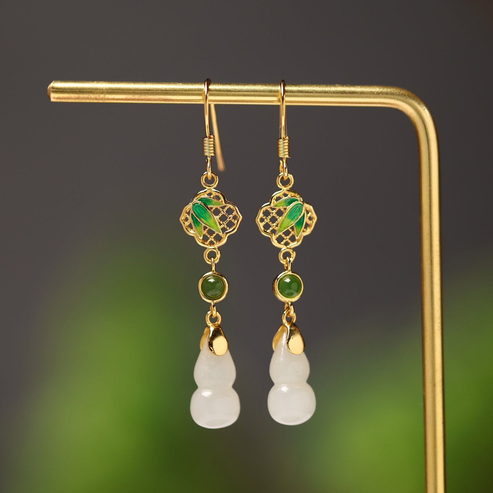 A Pair of Exquisite Sterling Silver-Gold Plated Inlaid White Jade Enamel Gourd Earrings: A Pair of Exquisite Sterling Silver-Gold Plated Inlaid White Jade Enamel Gourd Earrings,Size:7mmx13mm 一对纯银镀金镶白玉珐琅葫&#