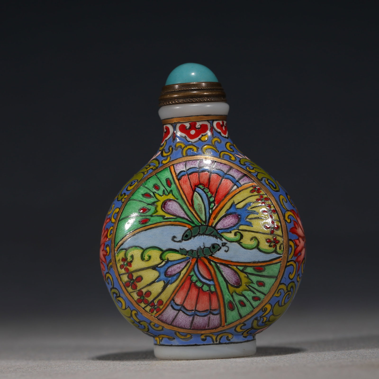 An Exquisite Glass Enamel Round Butterfly Pattern Snuff Bottle: An Exquisite Glass Enamel Round Butterfly Pattern Snuff Bottle,Qing Dynasty, China,Qianlong Four-character Mark,Size:1.8in×1in×2.7in 琉璃珐琅彩团蝶&