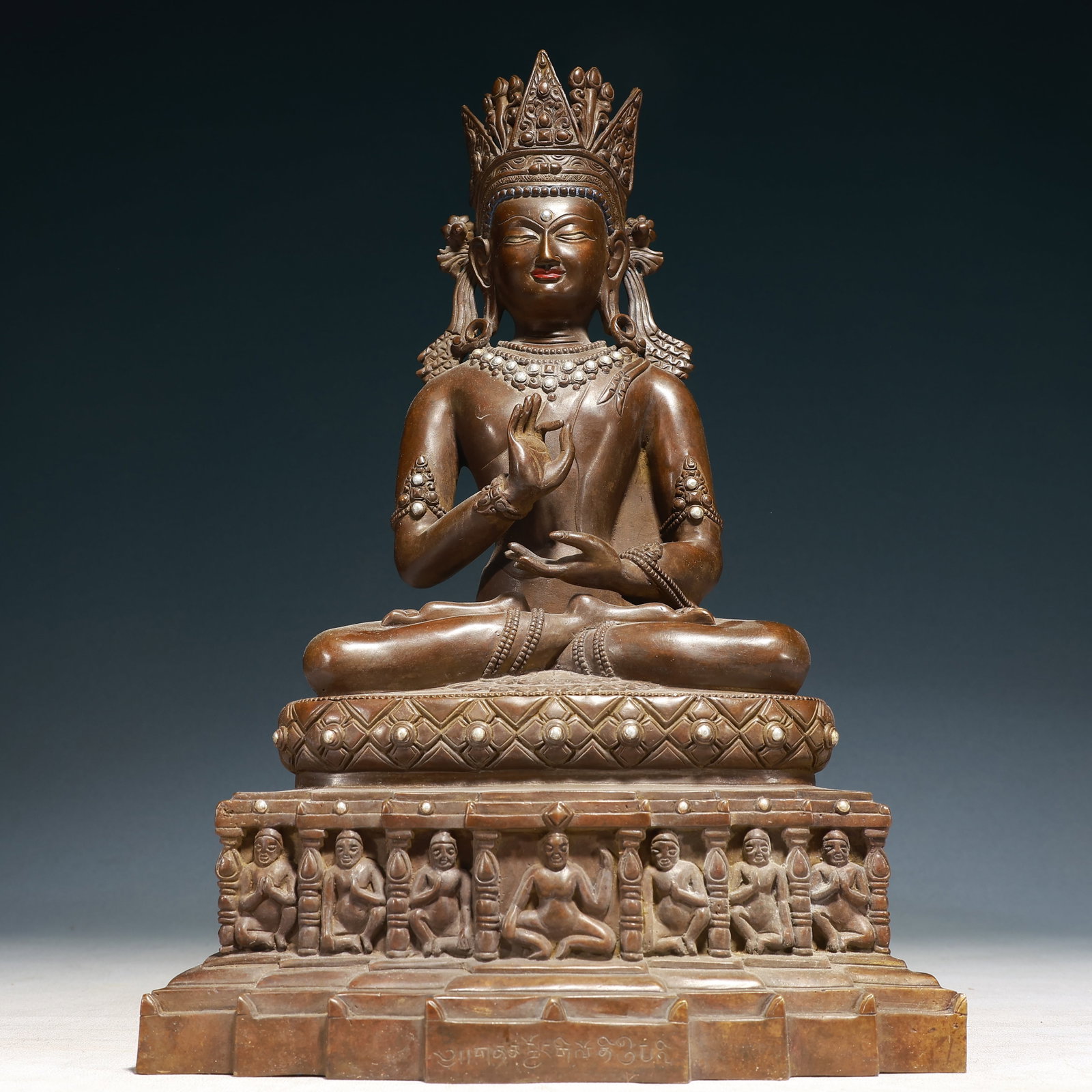A Solemn Bronze Inlaid Silver Statue of Sakyamuni: A Solemn Bronze Inlaid Silver Statue of Sakyamuni,Qing Dynasty,China,Size:10.2inx6.3inx15.4in,Weight:6400g 铜嵌银释迦摩尼像,中国清