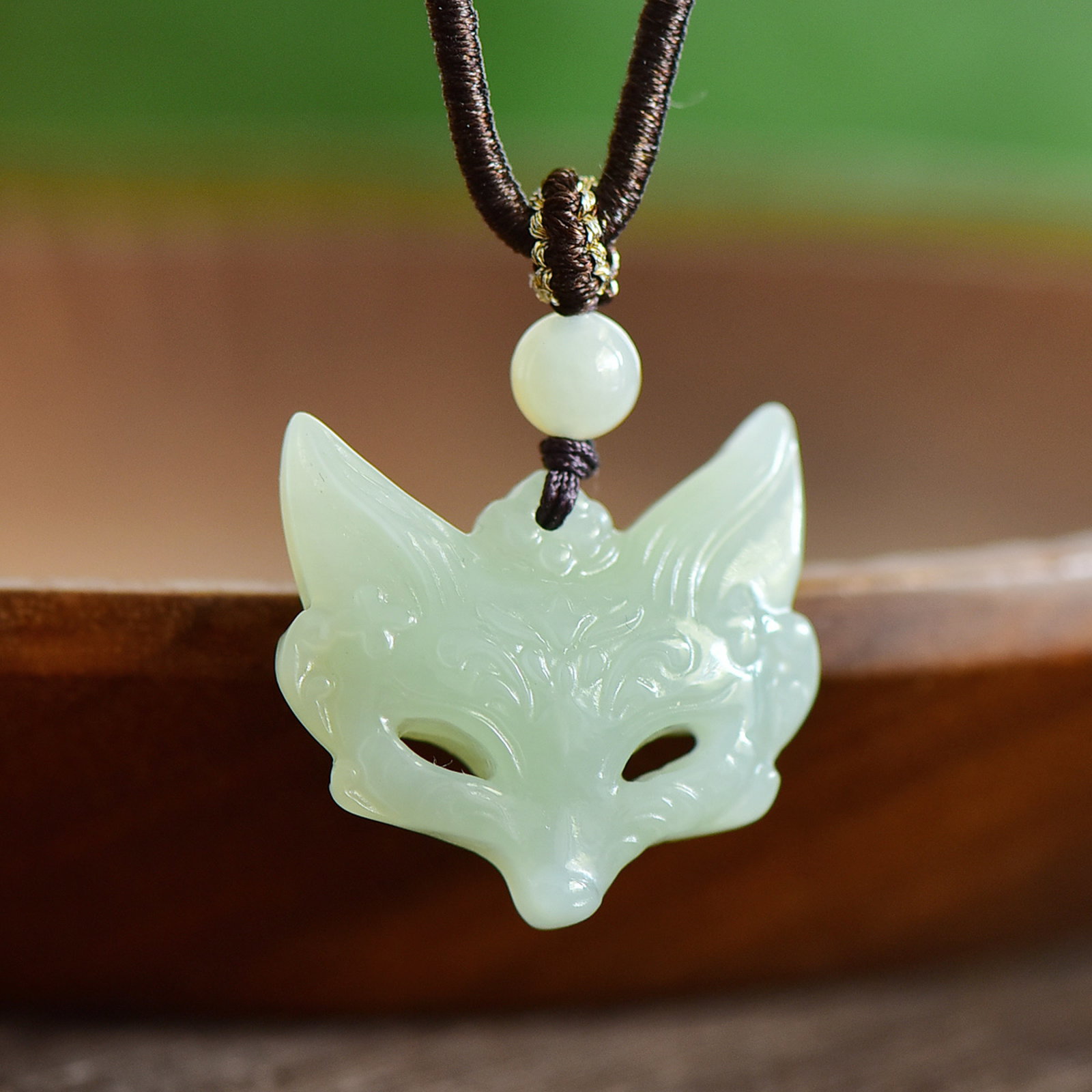 An Exquisite White Jade Fox Mask Pendant (1 of 5)