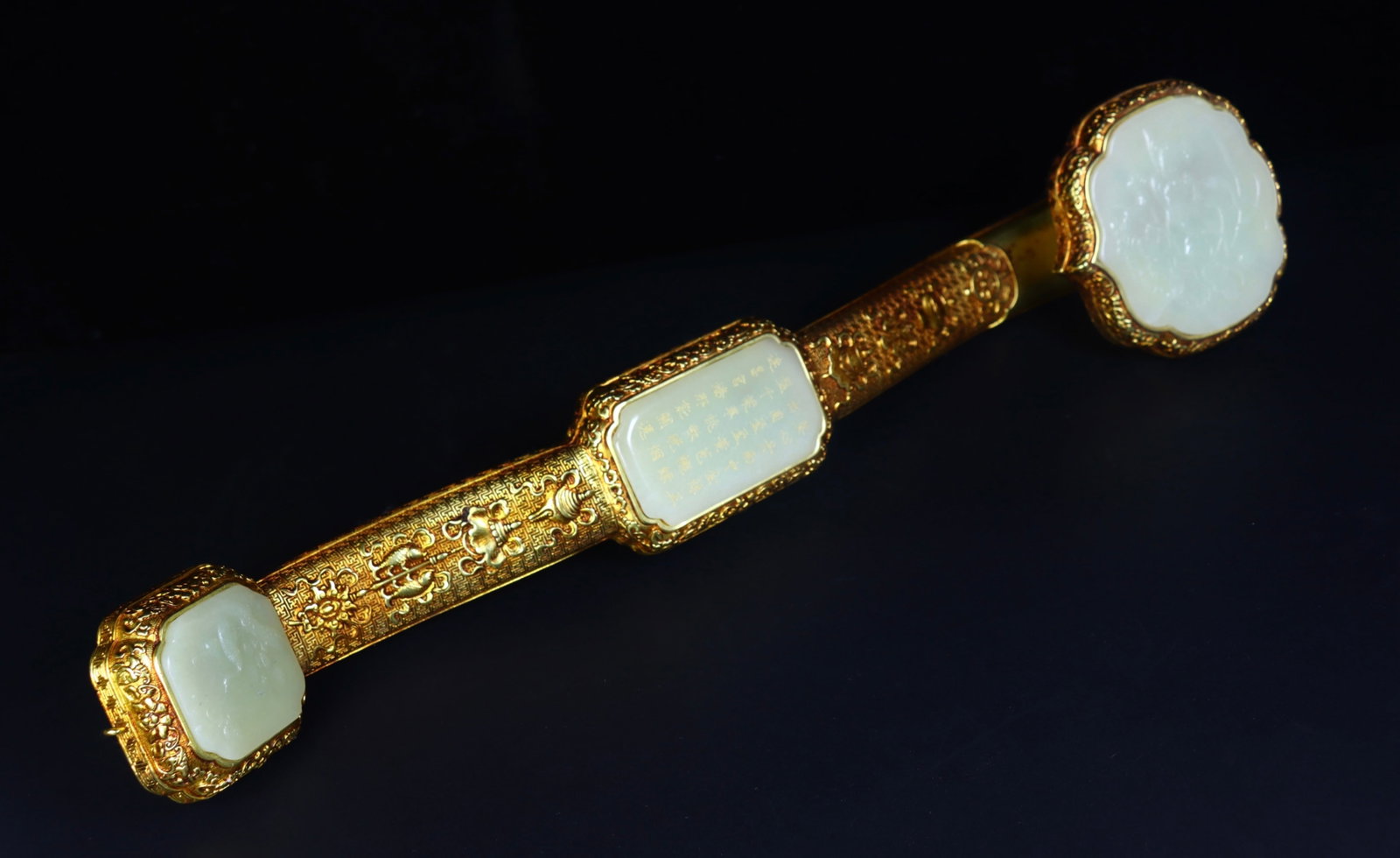 An Exquisite Gilt Bronze Inlaid White Jade Flower Pattern Ruyi,with poem: An Exquisite Gilt Bronze Inlaid White Jade Flower Pattern Ruyi,with poem,Qing Dynasty,China,Qianlong Four-character Mark,Size:18.4inx161.8in,Weight:3kg 铜鎏金嵌白玉
