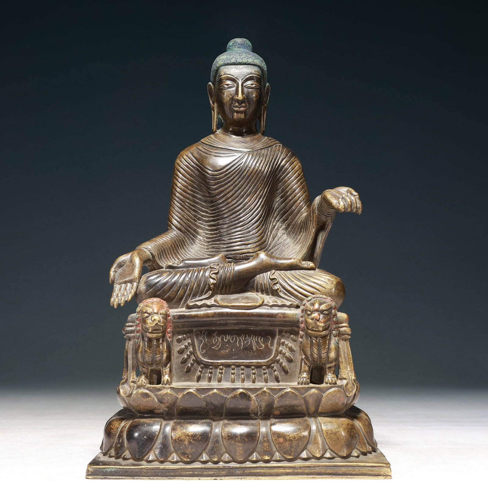 A Solemn Bronze Statue of Sakyamuni,With Inscription: A Solemn Bronze Statue of Sakyamuni,With Inscription,Qing Dynasty, China,Size:7.1inx5.1inx11.8in,Weight:5100g 铜释迦摩尼像,带铭文,中国