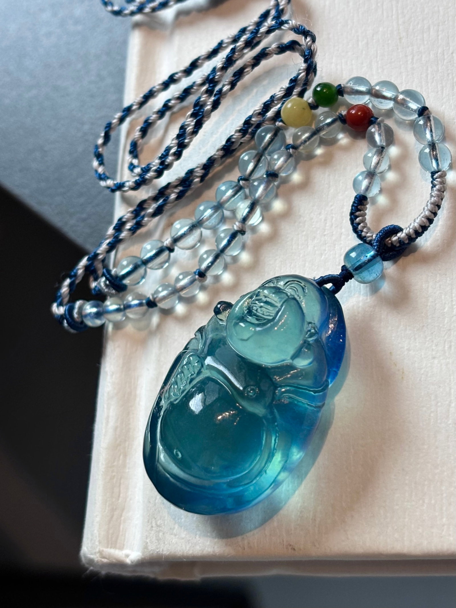An Exquisite Aquamarine Statue of Maitreya Buddha Necklace: An Exquisite Aquamarine Statue of Maitreya Buddha Necklace,Size:34mmx23mmx15mm,Weight:20.5g 海蓝宝弥勒佛像项链