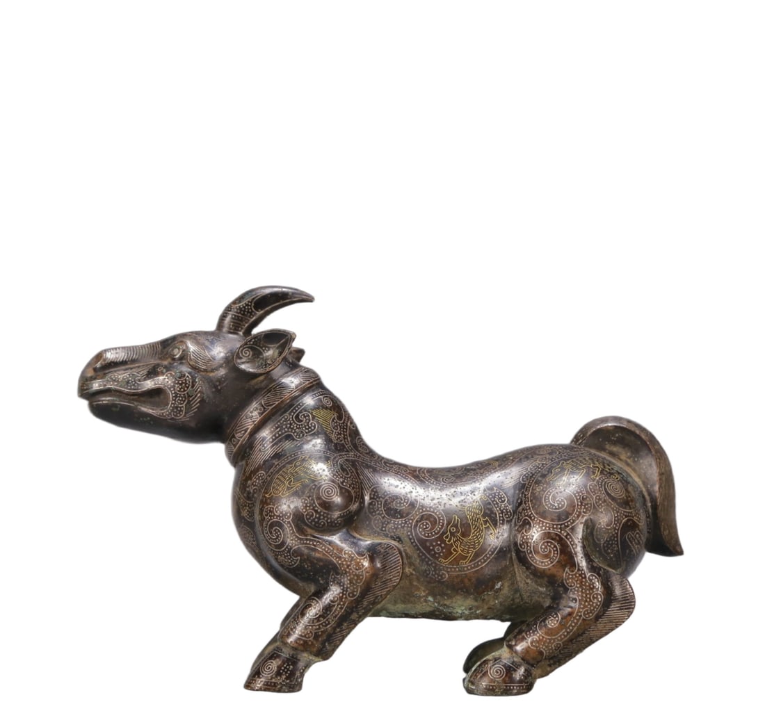 A Exquisite Gold and Silver-Inlaid Bronze Rhinoceros Ornament: A Exquisite Gold and Silver-Inlaid Bronze Rhinoceros Ornament Ancient Time, China ,Size:9.1inx3.3inx7.1in Weight:1500g 铜错金银犀牛 远古时期