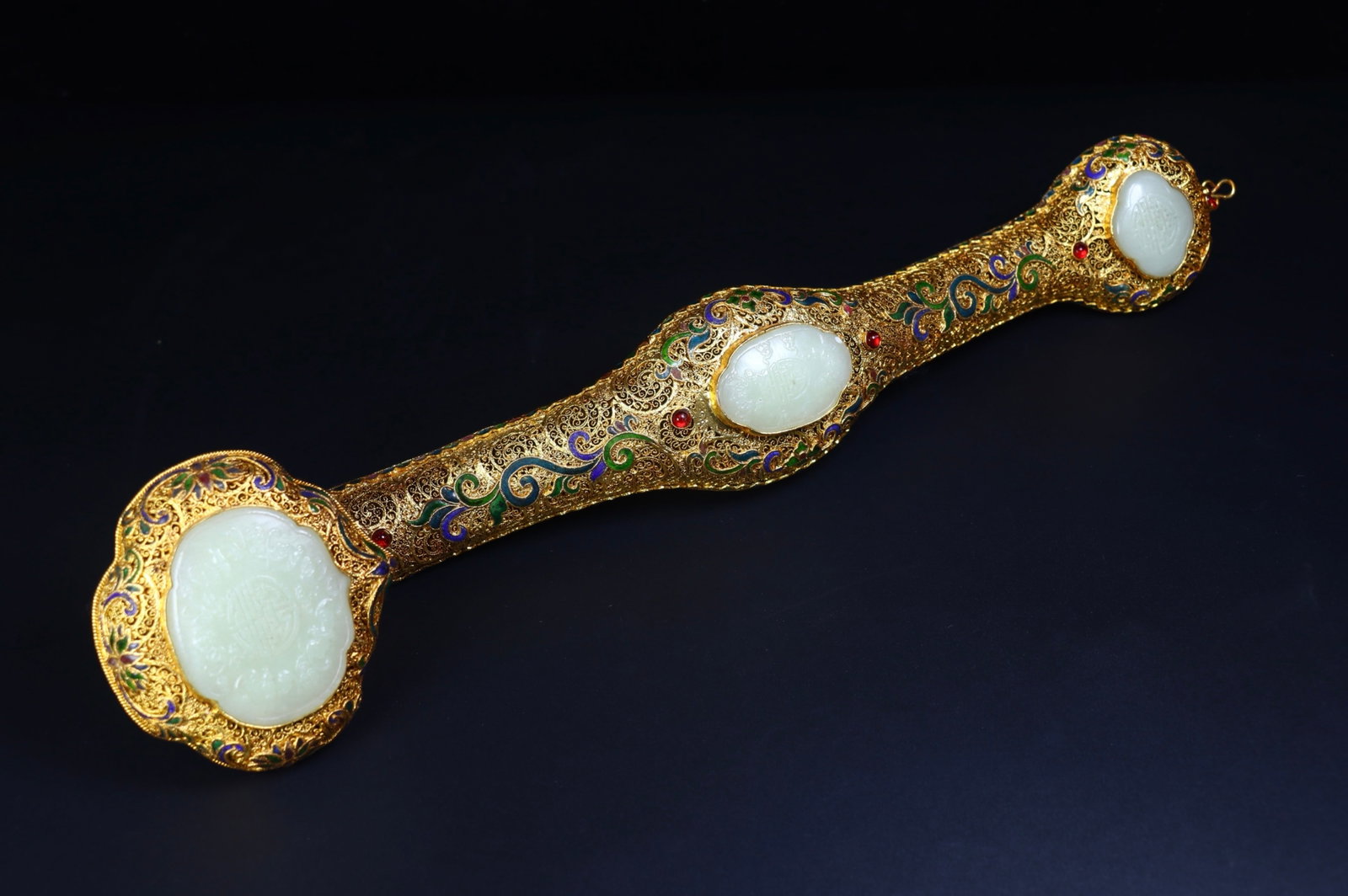 An Exquisite Filigree and Gilding Inlaid White Jade Flower Pattern Ruyi,Inlaid Gems: An Exquisite Filigree and Gilding Inlaid White Jade Flower Pattern Ruyi,Inlaid Gems,Qing Dynasty,China,Qianlong Four-character Mark,Size:17.7inx3.7in,Weight:741g