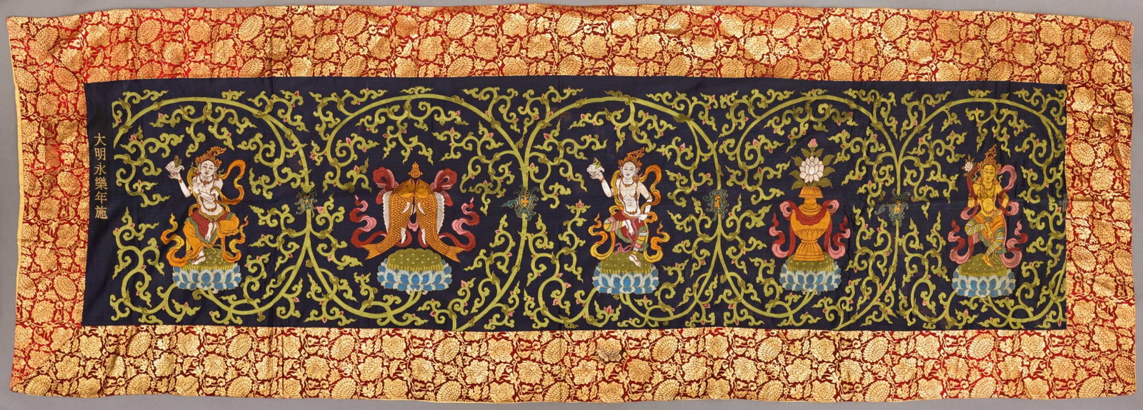 Cloud Brocade Supporting Goddess Picture: Ming Dynasty style: Shi Yunjin in the Yongle Year of the Ming Dynasty. Size: 114.2in×38.6in. This picture shows three supporting celestial maidens, holding tributes in their hands. Wearing collar
