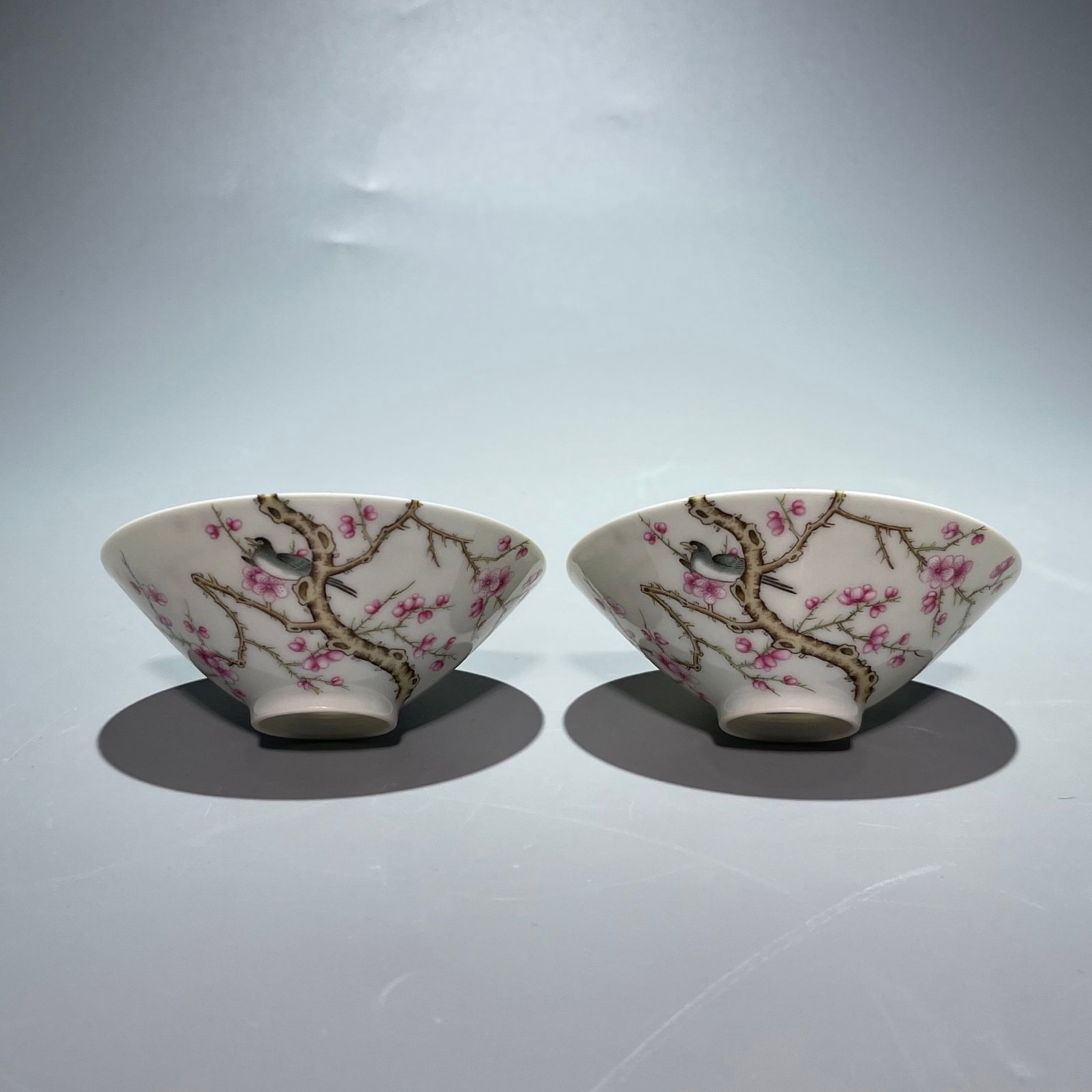 A Pair of Exquisite Famille-Rose Flower and Bird Pattern Cups,with poem: A Pair of Exquisite Famille-Rose Flower and Bird Pattern Cups,with poem,Qing Dynasty,China,Qianlong Six-character Mark,Size:3.5inx1.3in 一对粉彩花鸟纹杯