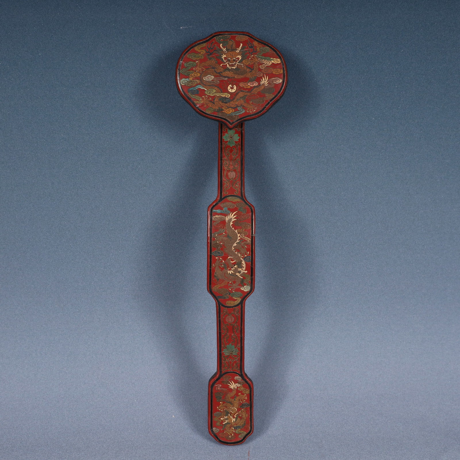 A Huge Carved Red Lacquer Painted Color Auspicious Cloud and Dragon Pattern Ruyi: A Huge Carved Red Lacquer Painted Color Auspicious Cloud and Dragon Pattern Ruyi,Qing Dynasty, China,Qianlong Six-character Mark,Size:15.7inx3.9inx2in,Weight:150g 剔红漆彩ń