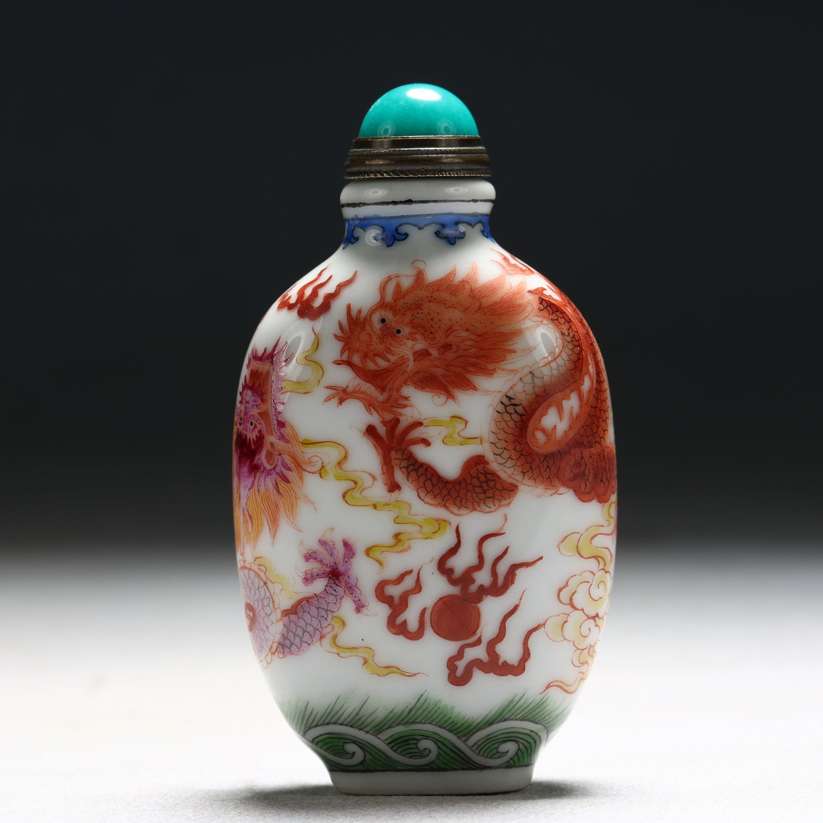 An Exquisite Enamel Auspicious Cloud and Dragon Pattern Porcelain Snuff Bottle: An Exquisite Enamel Auspicious Cloud and Dragon Pattern Porcelain Snuff Bottle,Qing Dynasty, China,Qianlong Mark,Size:1.8inx0.8inx3.1in