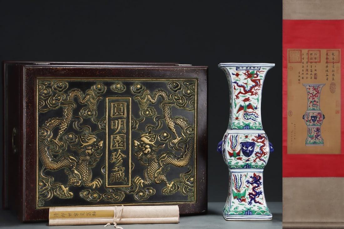 A Huge Wucai gu beaker vase decorated with dragon and phoenix, with a silk painting hanging scroll: A Huge Wucai gu beaker vase decorated with dragon and phoenix, with a silk painting hanging scroll,Ming Dynasty, China, Wanli Six-character Mark,Size:18.8inx7in,(Without frame)24.8inx12.6in 五&#