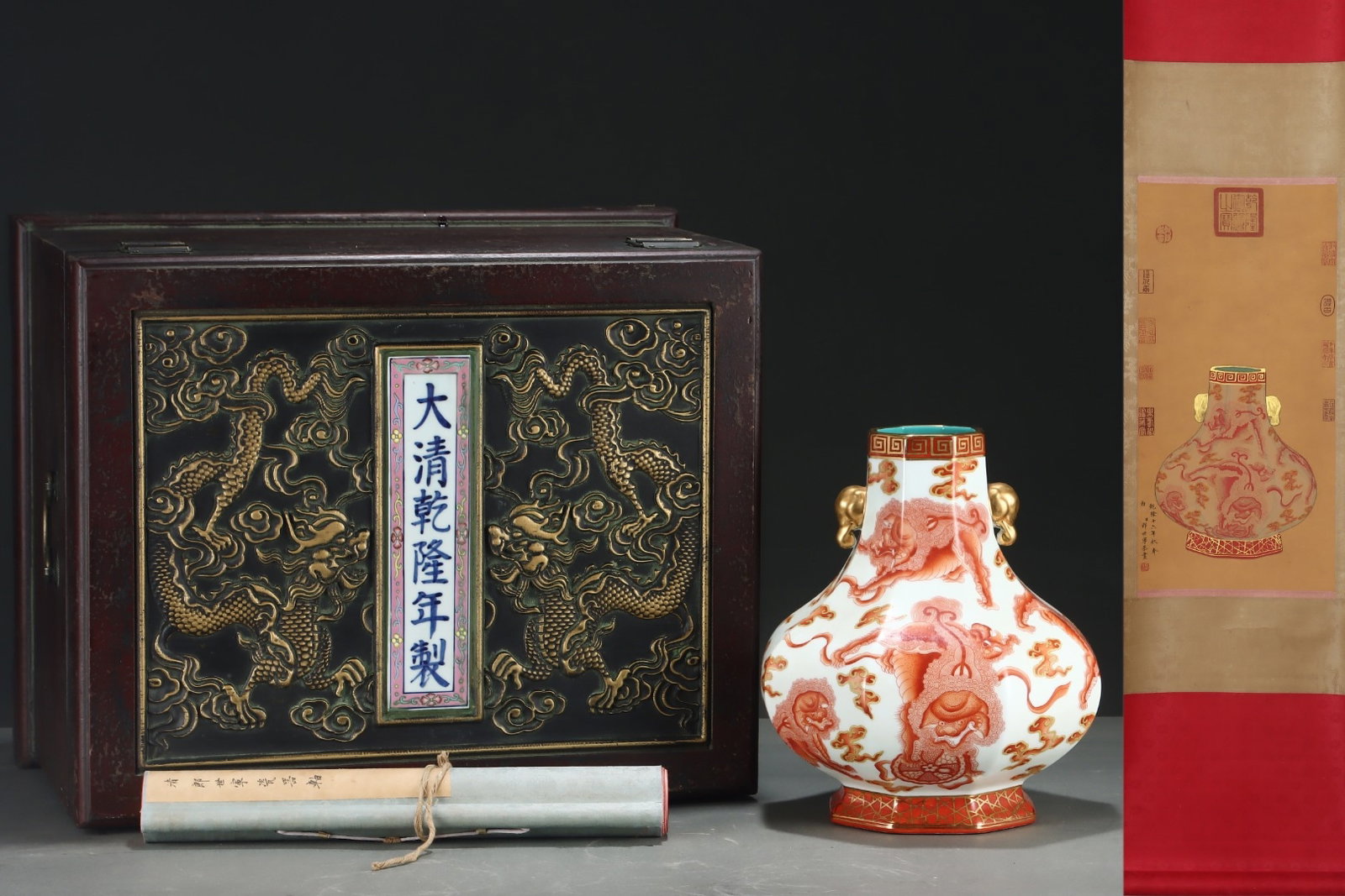 An Exquisite Iron-Red Painted Gold Auspicious Cloud and Lion Pattern Elephant-Ears Vase,With: An Exquisite Iron-Red Painted Gold Auspicious Cloud and Lion Pattern Elephant-Ears Vase,With Vertical Scroll Painting on Silk,Qing Dynasty, China,Qianlong Four-character Mark,Size:11inx9.6in,(Without 